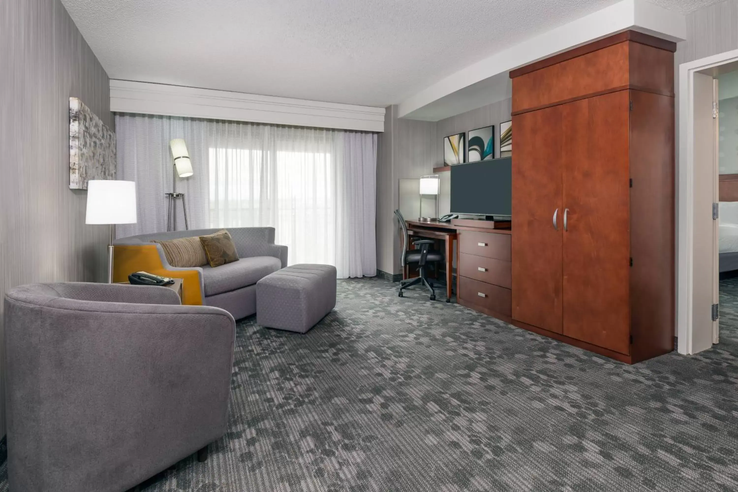 Living room, Seating Area in Courtyard by Marriott Buffalo Airport