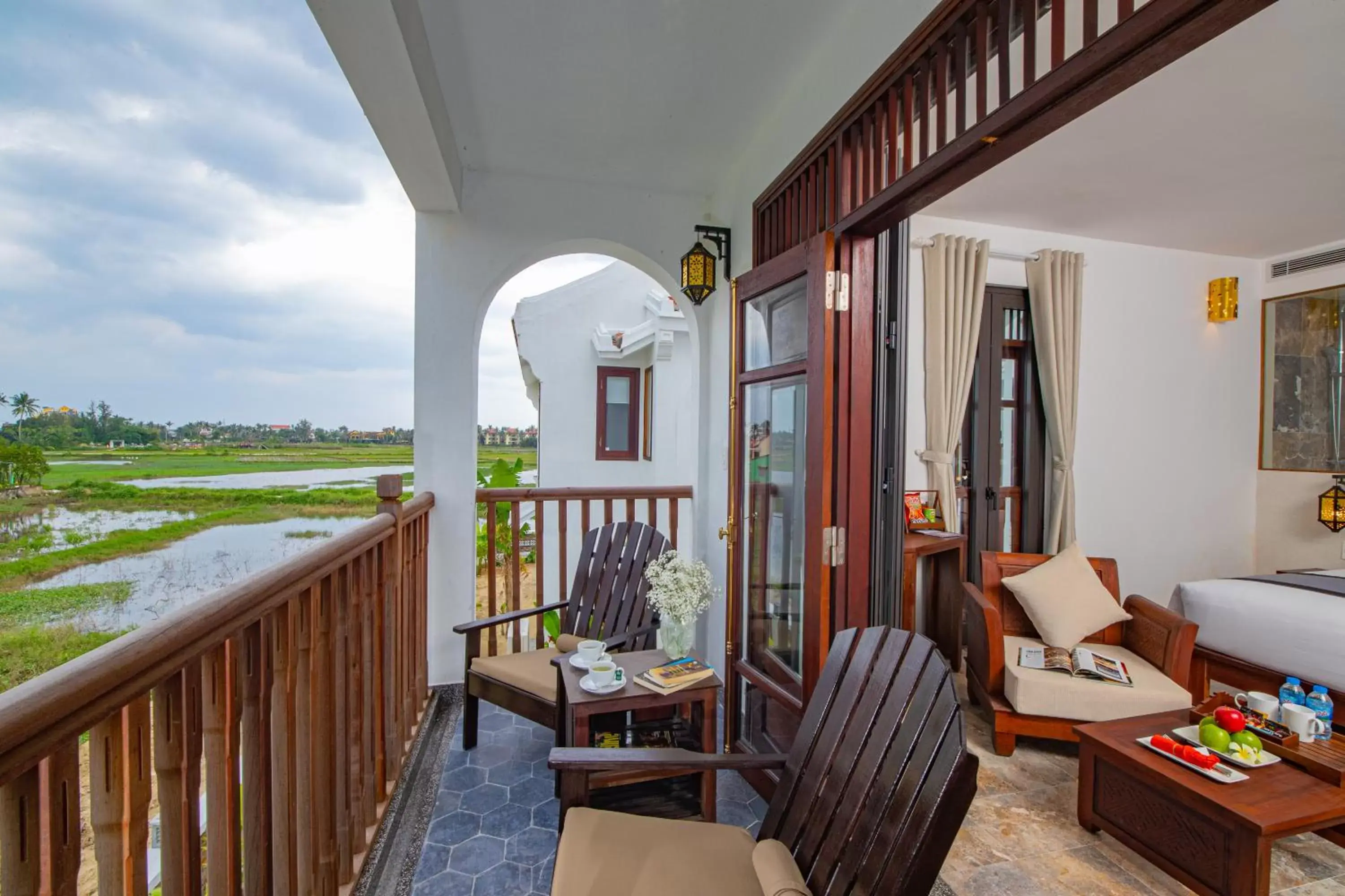 Deluxe Rice Field view with Balcony in Legacy Hoi An Resort - formerly Ancient House Village Resort & Spa