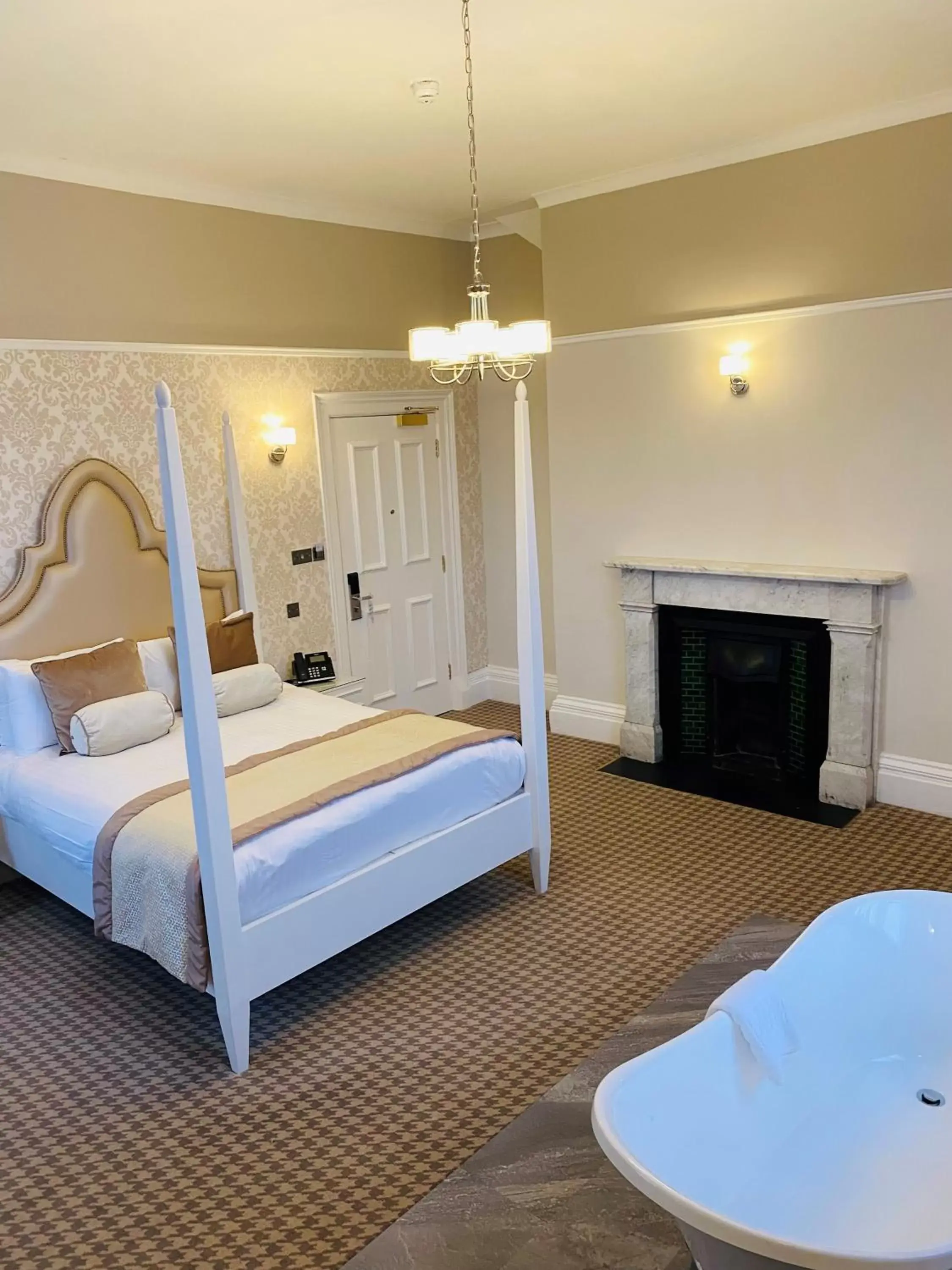 Bed in Wroxall Abbey Hotel