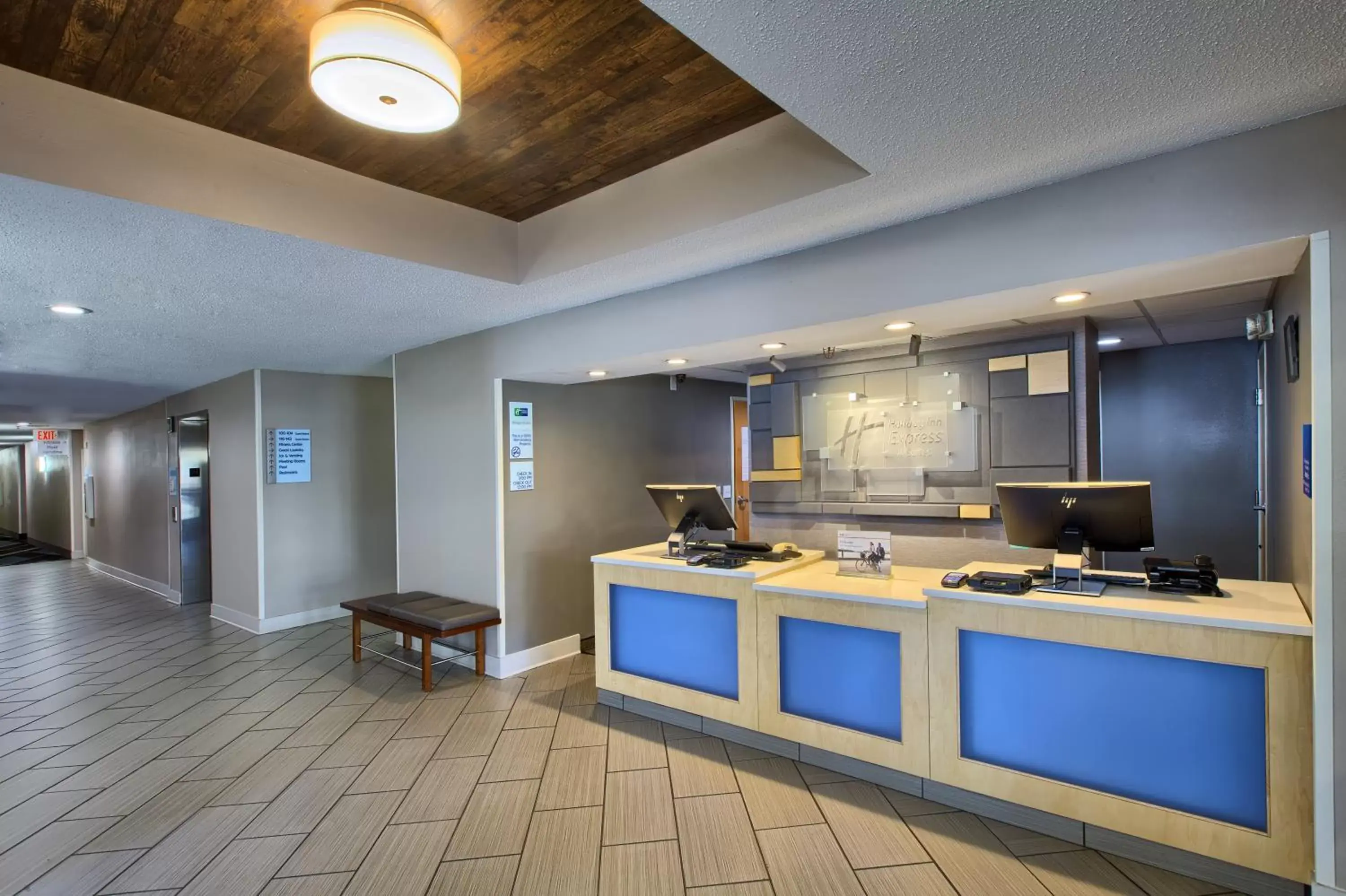 Lobby or reception, Kitchen/Kitchenette in Holiday Inn Express Hotel & Suites Raleigh North - Wake Forest, an IHG Hotel