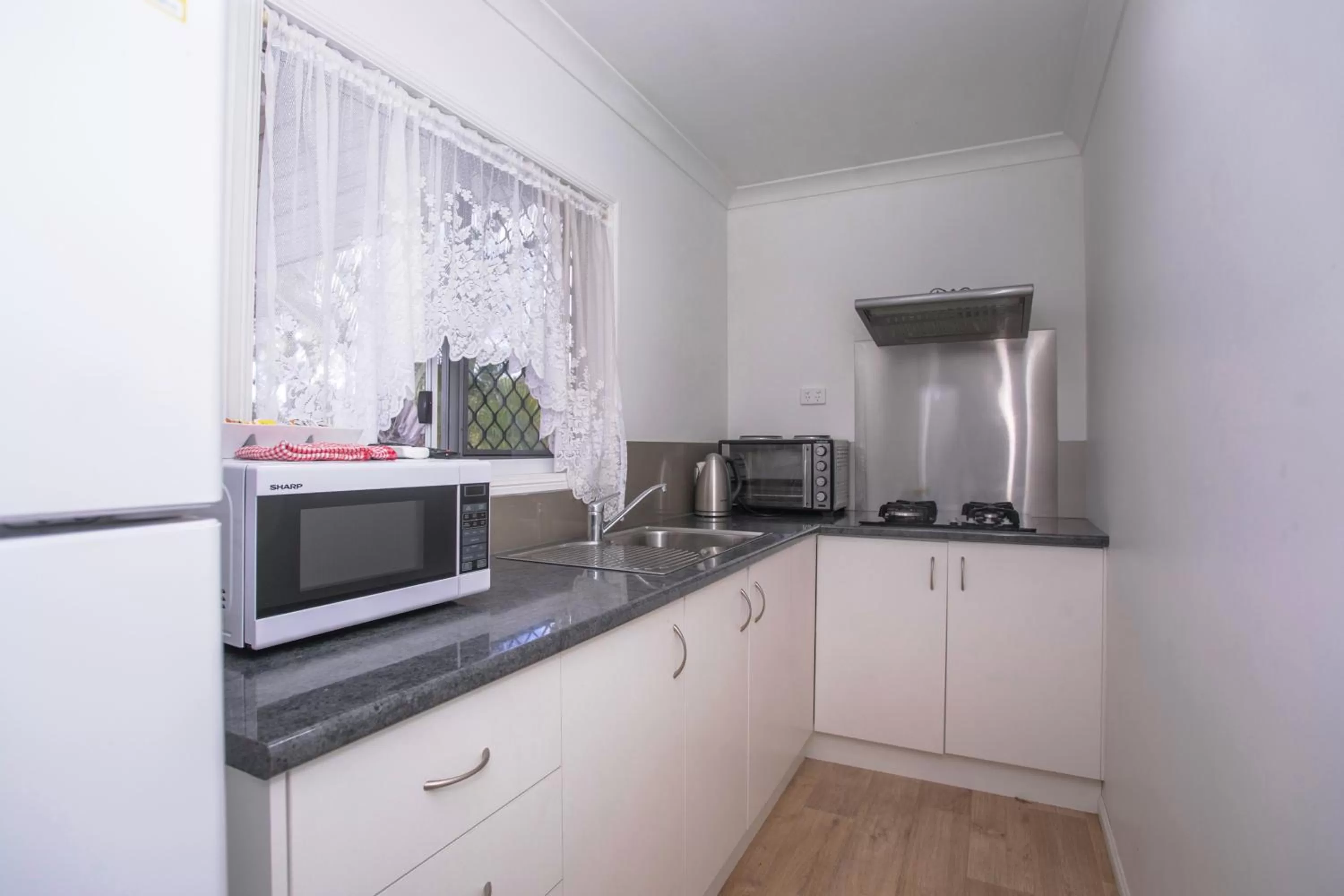 Kitchen or kitchenette in Bundaberg Park Village