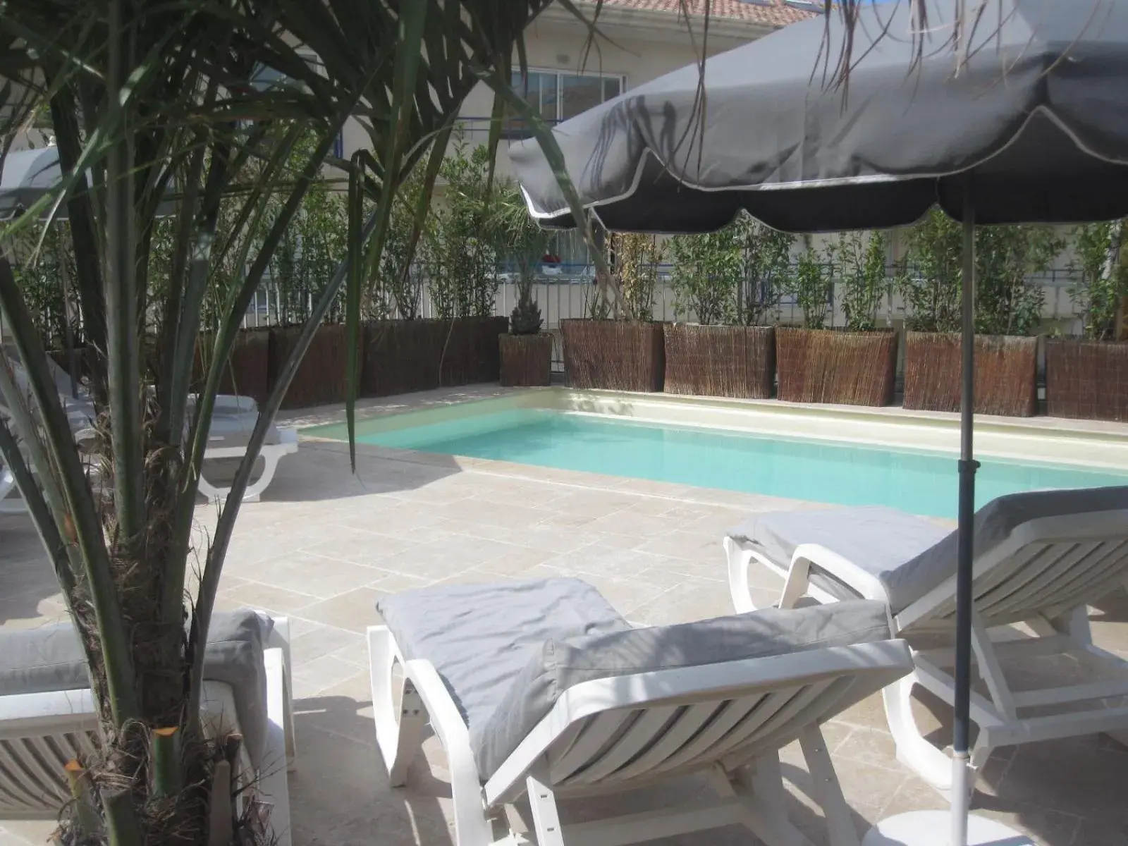 Balcony/Terrace, Swimming Pool in Hotel Le Revest