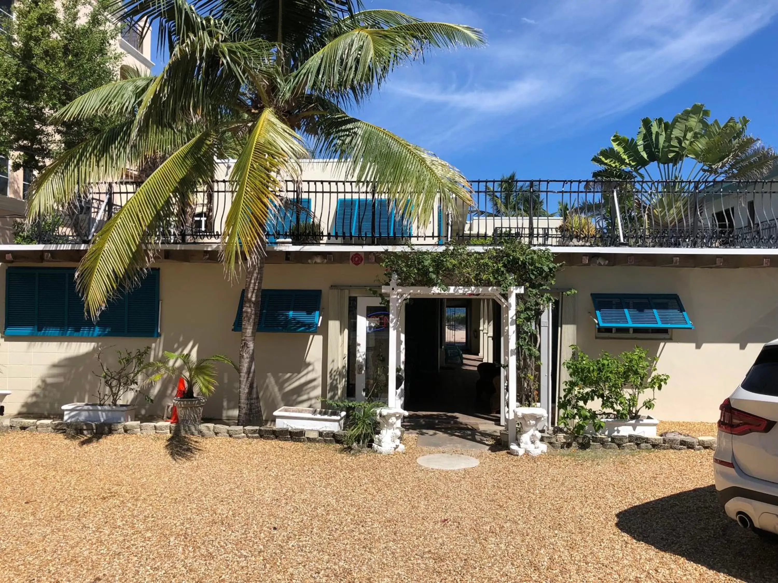 Facade/entrance, Property Building in Courtyard Villa Hotel