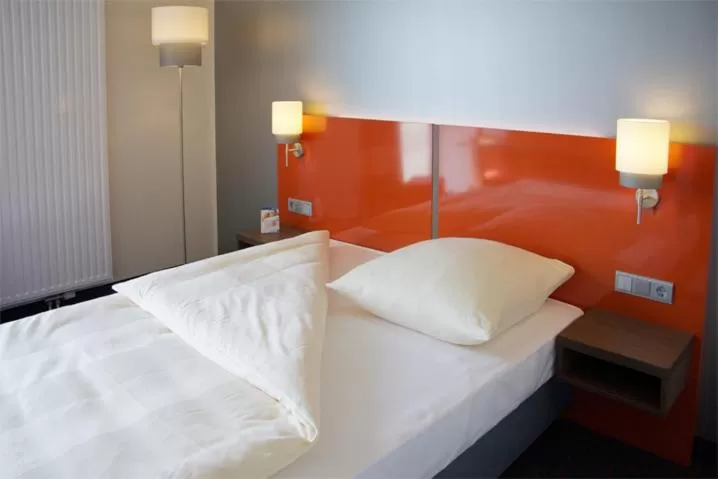Bed in iQ-Hotel Ulm