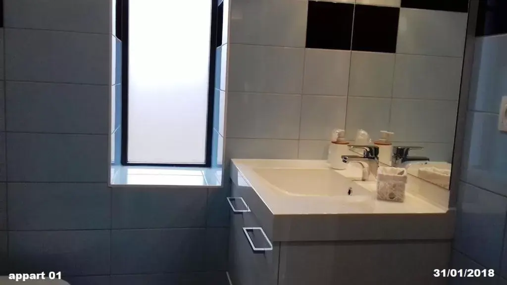 Bathroom in Appart'Hotel Parc Johan