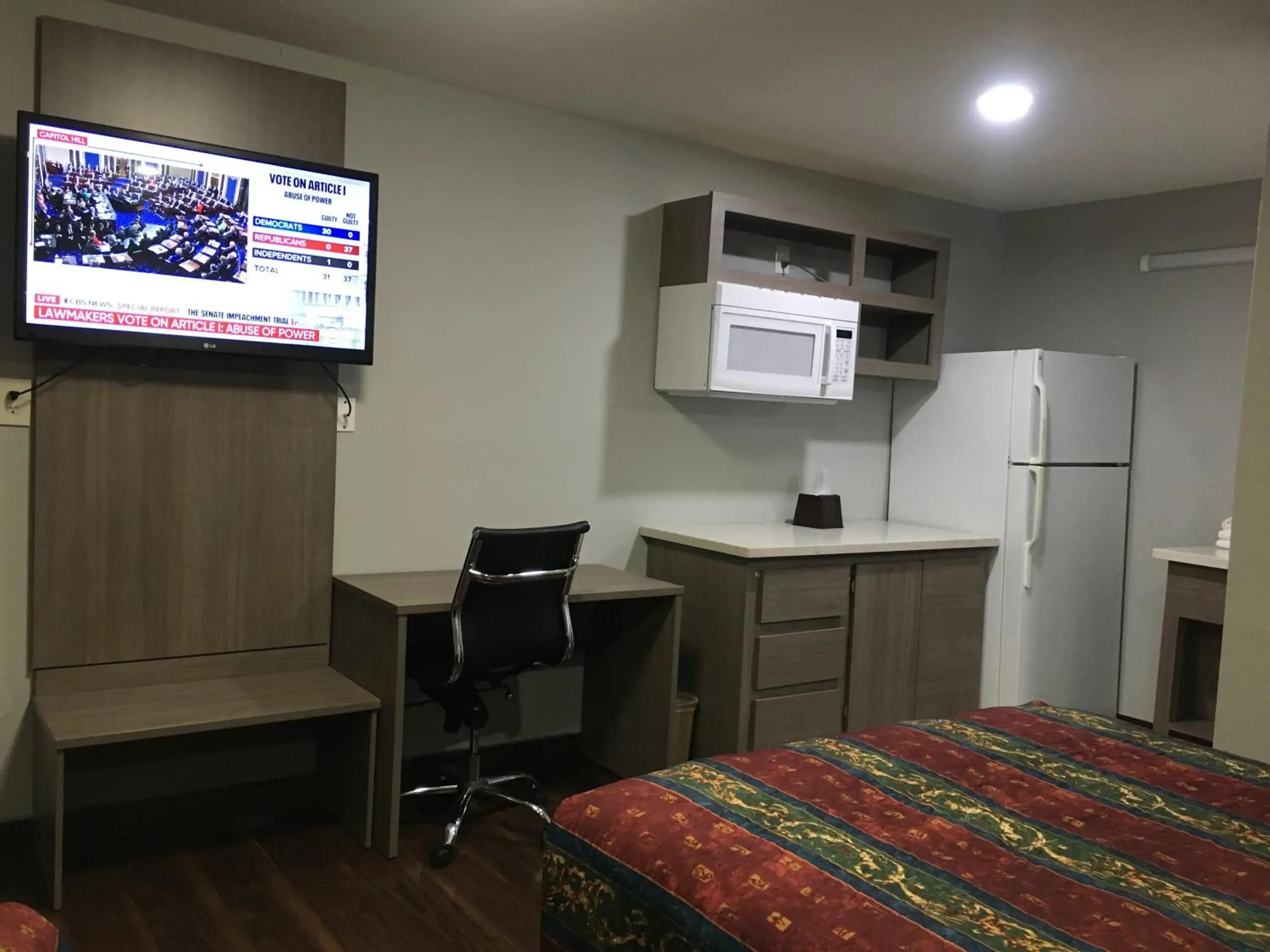 TV and multimedia, TV/Entertainment Center in Travel Inn & Suites