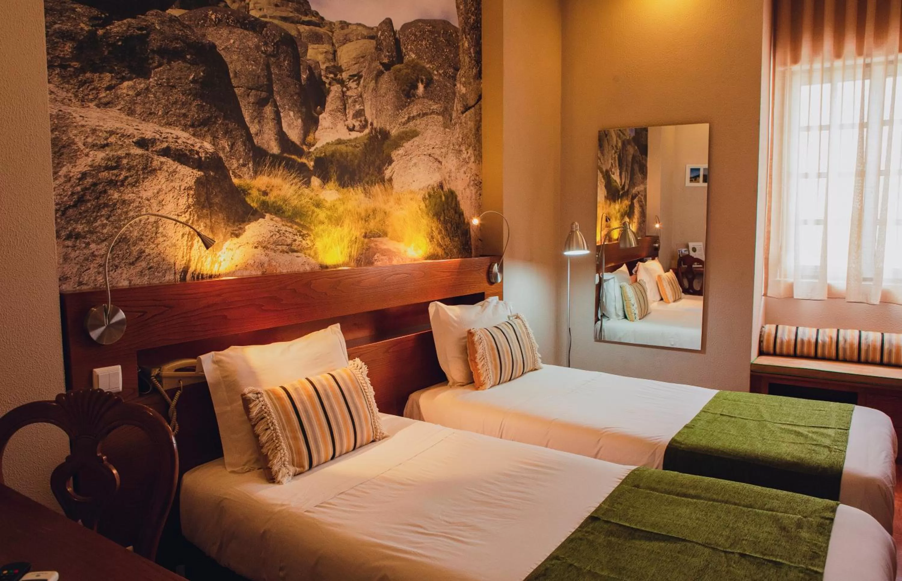 Bed in Hotel Império do Rei