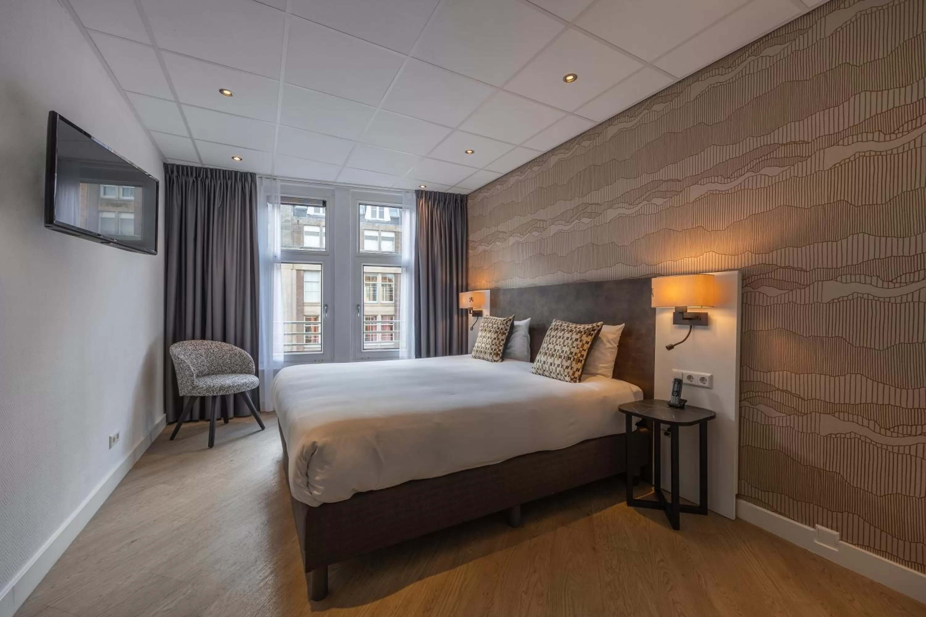 Bed in Hotel Amsterdam De Roode Leeuw