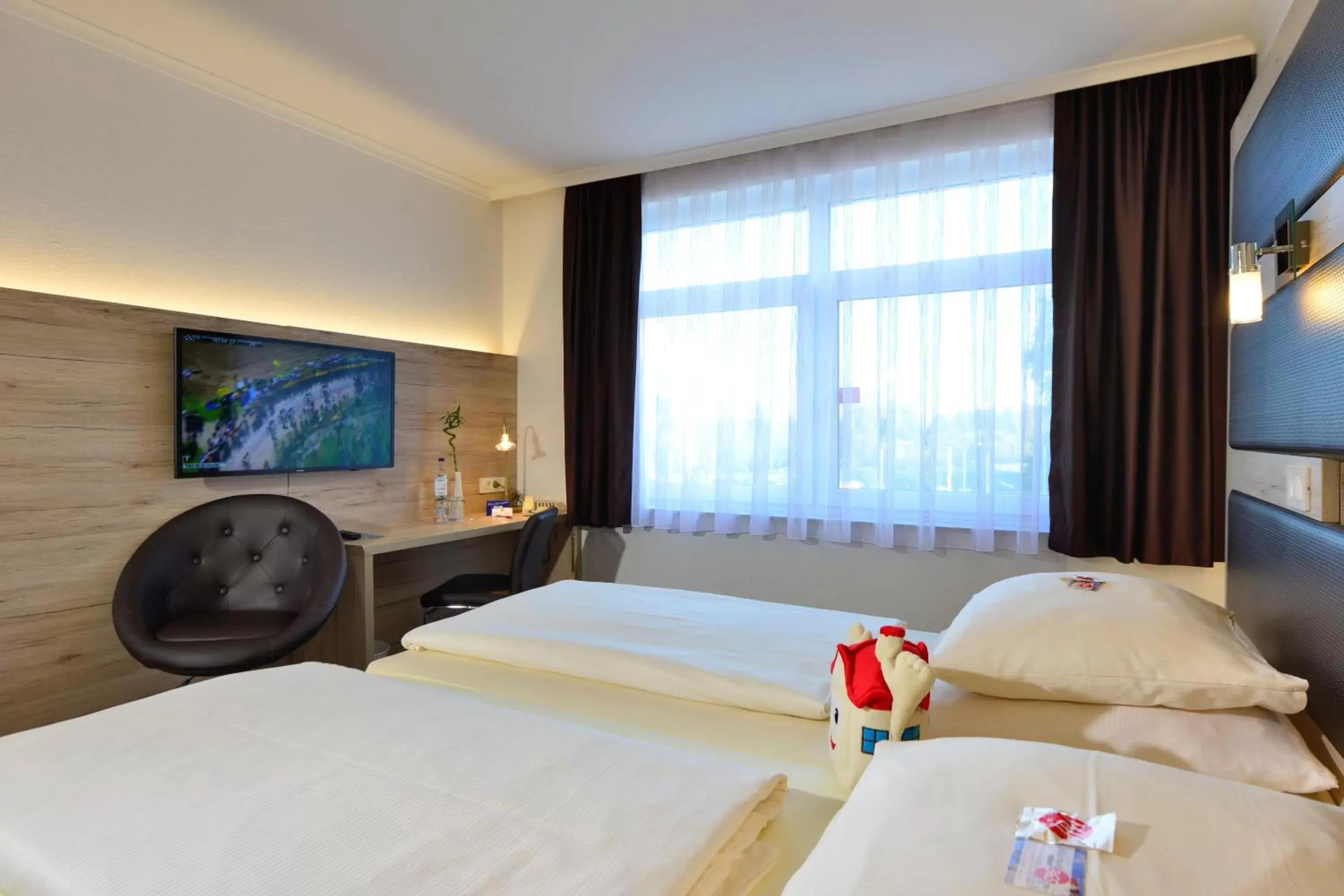 Photo of the whole room, Bed in Roomingtons Lüneburger Heide Photo of the whole room, Bed in Roomingtons Lüneburger Heide