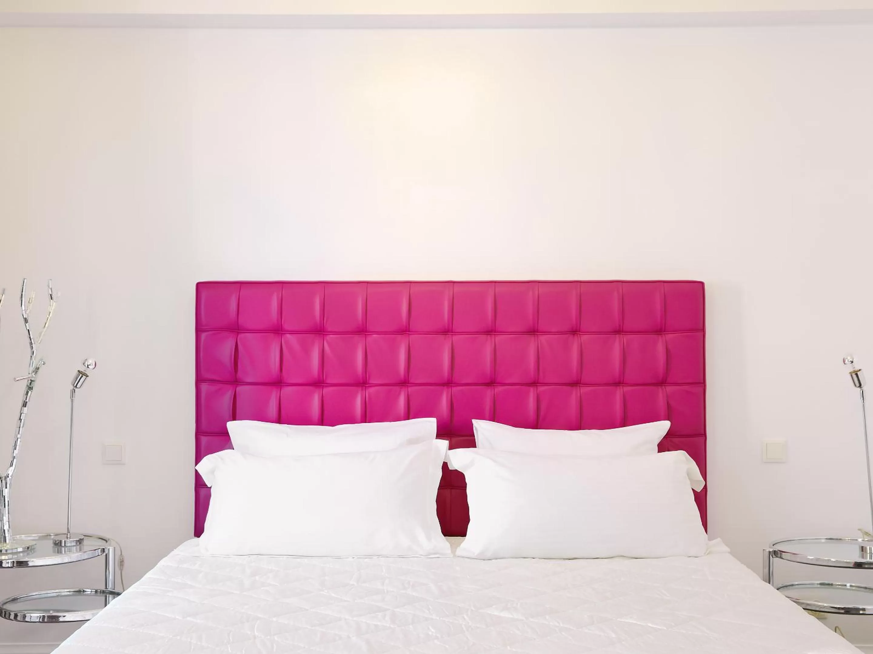 Bed in Grecotel Pallas Athena