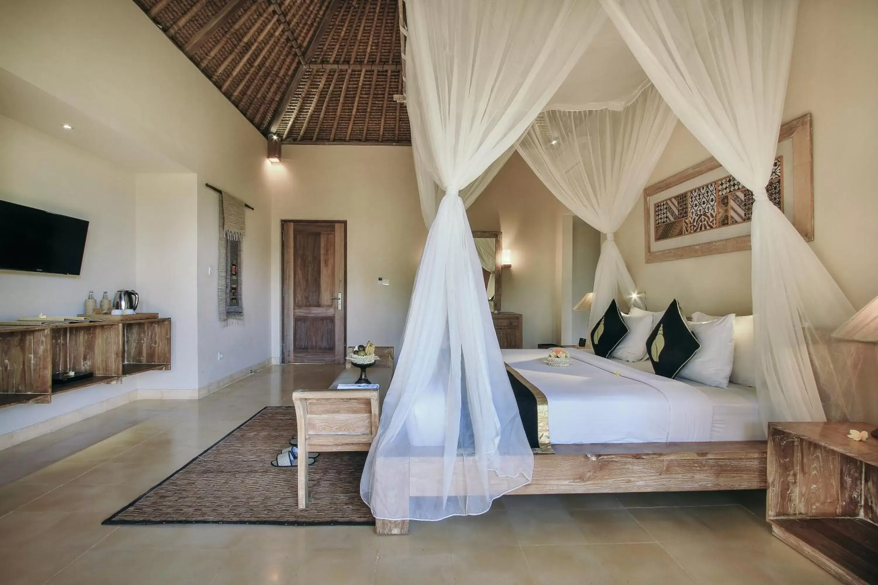 Bed in The Sankara Resort by Pramana
