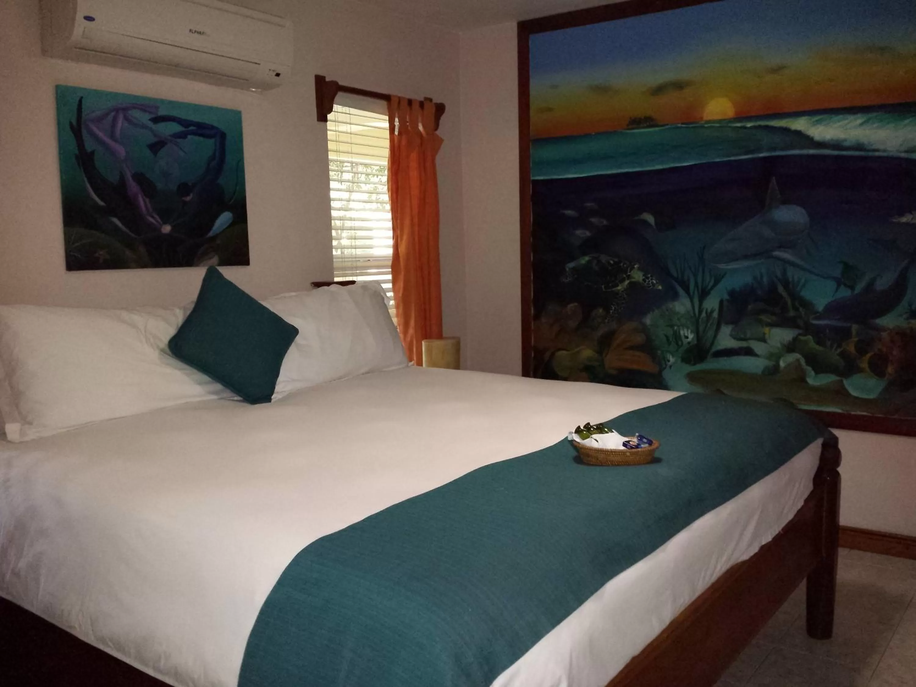 Photo of the whole room, Bed in The Palms Oceanfront Suites