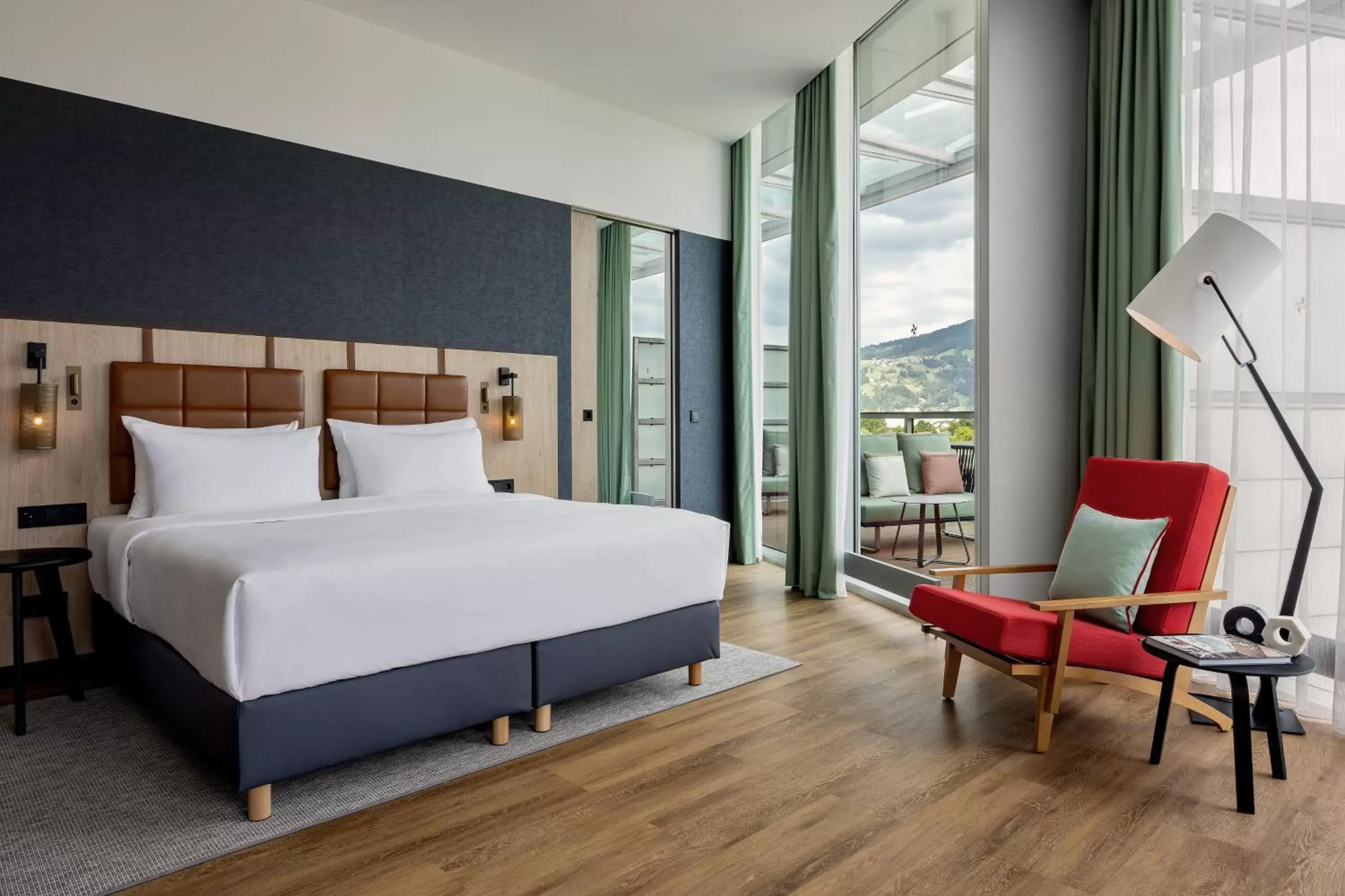 Photo of the whole room, Bed in Four Points by Sheraton Panoramahaus Dornbirn