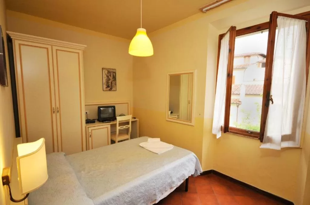 Photo of the whole room, Bed in Hotel Azzi