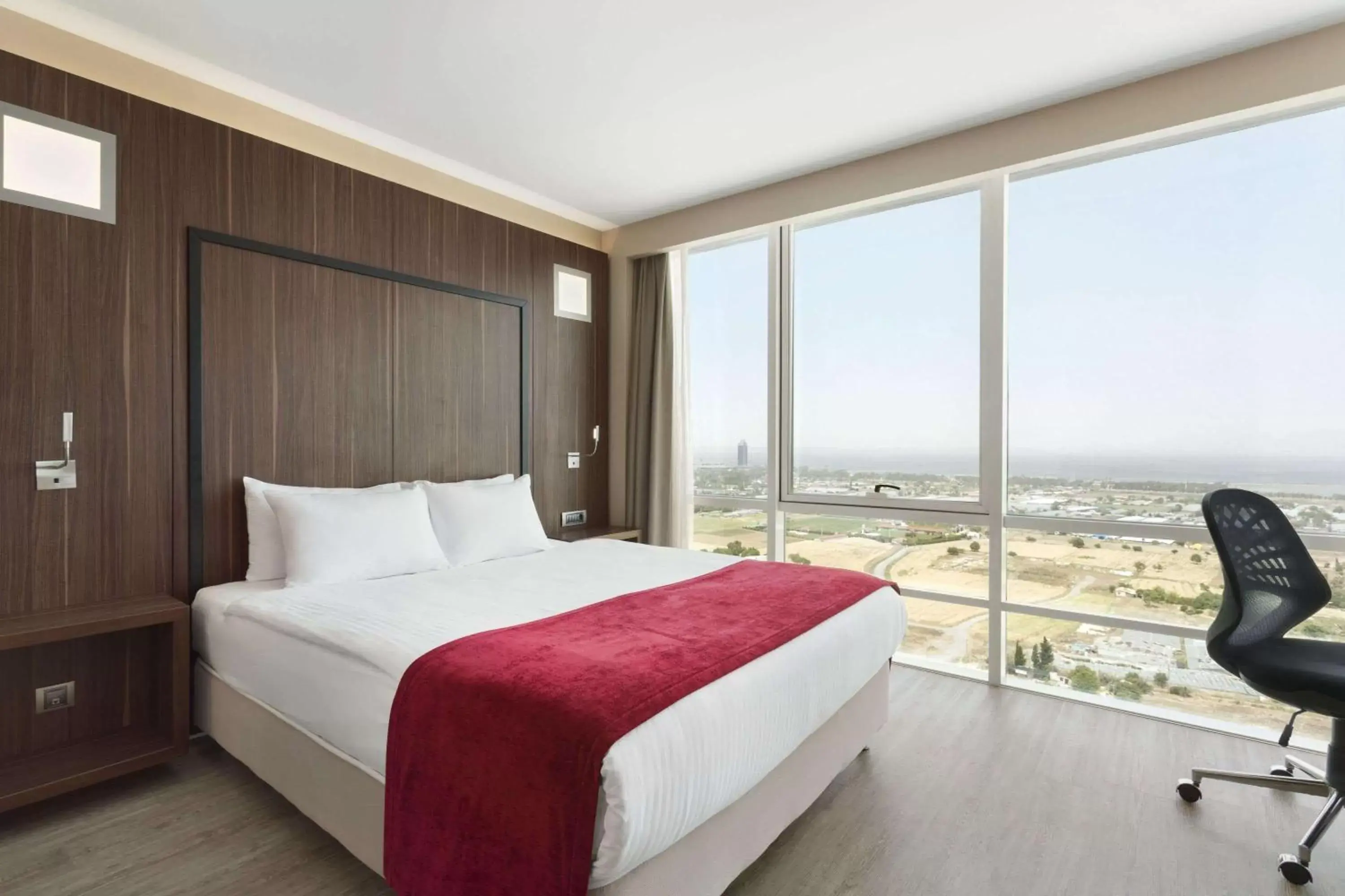 Photo of the whole room, Bed in Ramada Encore by Wyndham Izmir