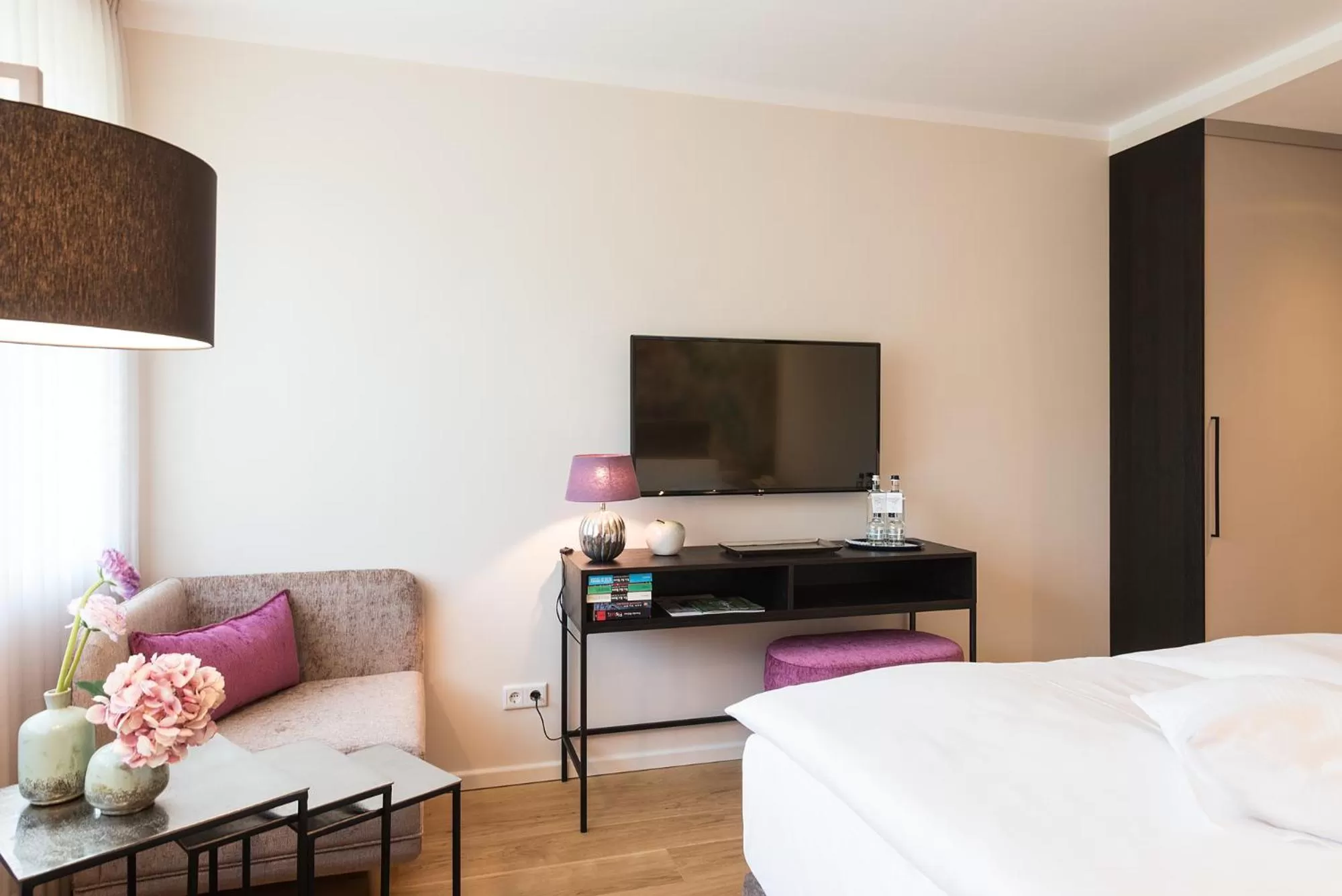 TV and multimedia, Bed in MUNTE - Wellnesshotel am Stadtwald