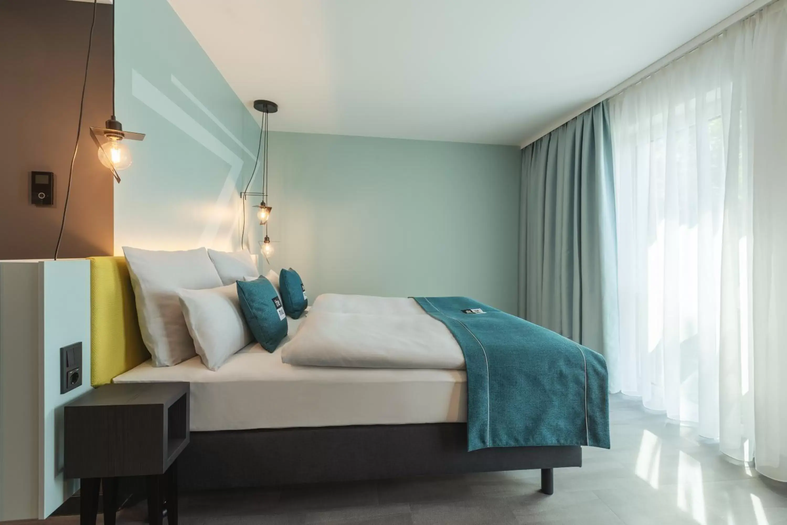 Bed in Holiday Inn - the niu, Seven Dusseldorf Ost by IHG Bed in Holiday Inn - the niu, Seven Dusseldorf Ost by IHG