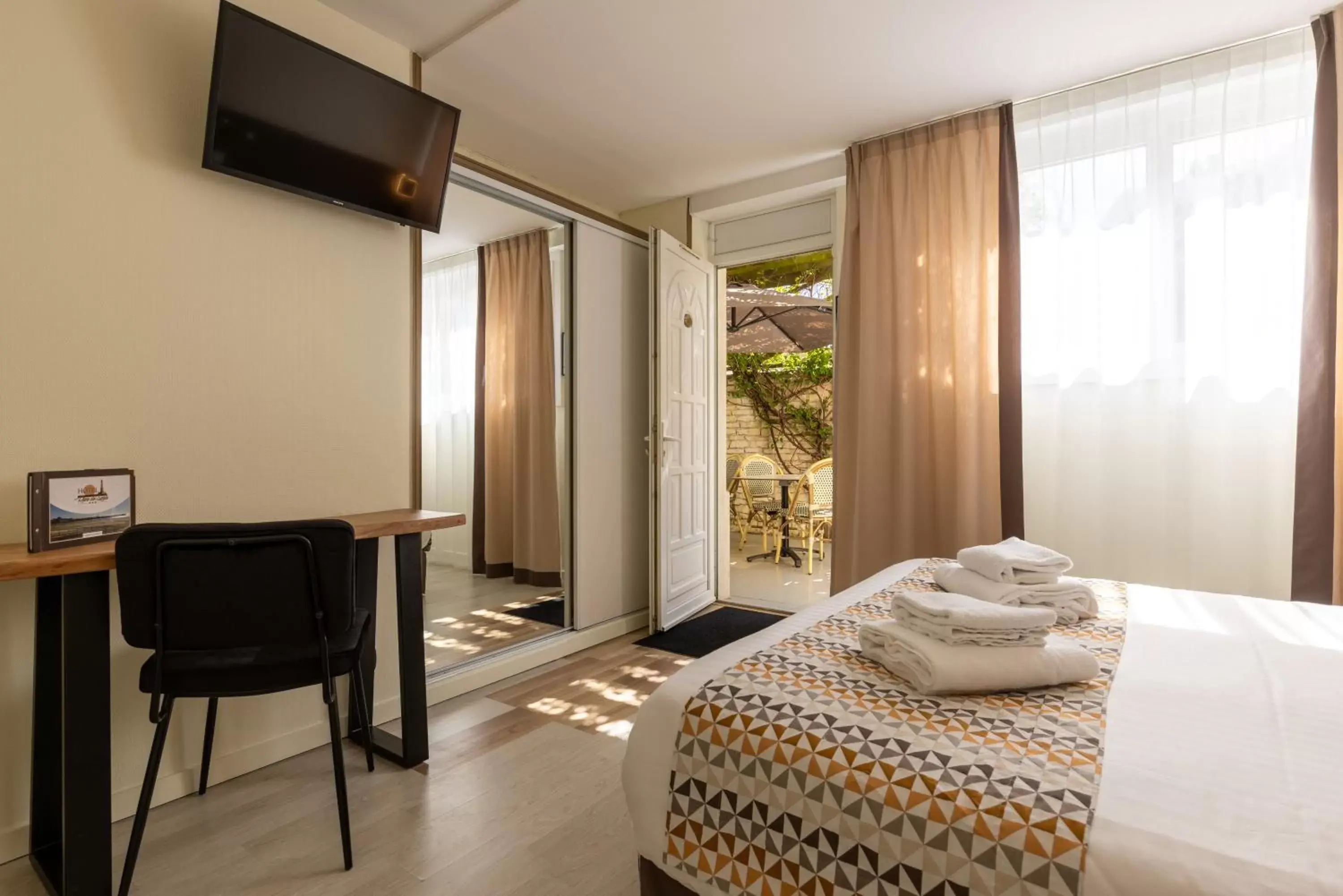 Twin Room Garden view - Disability Access in Logis Hôtel Rêve de Sable Twin Room Garden view - Disability Access in Logis Hôtel Rêve de Sable