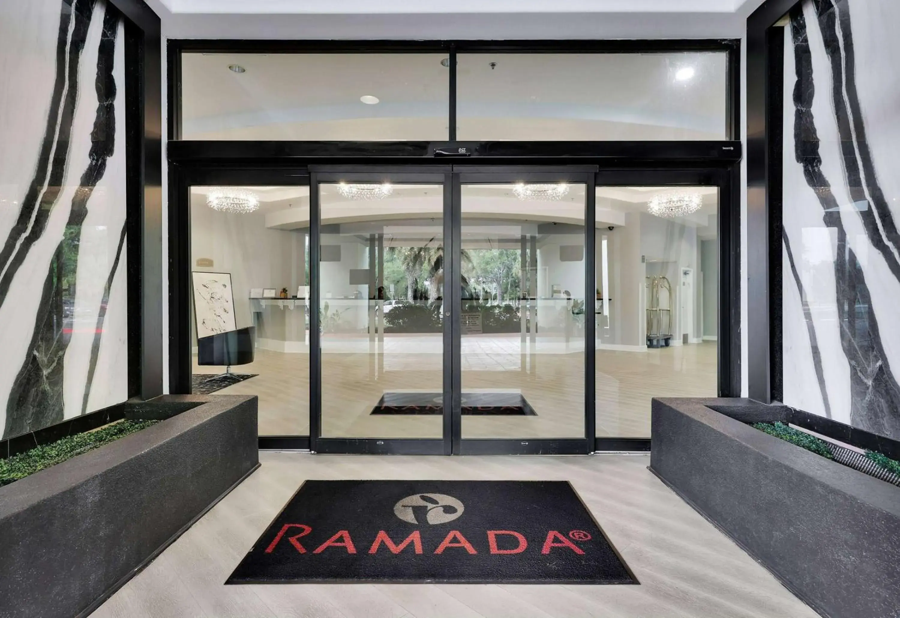 Lobby or reception in Ramada by Wyndham Jacksonville I-95 by Butler Blvd Lobby or reception in Ramada by Wyndham Jacksonville I-95 by Butler Blvd