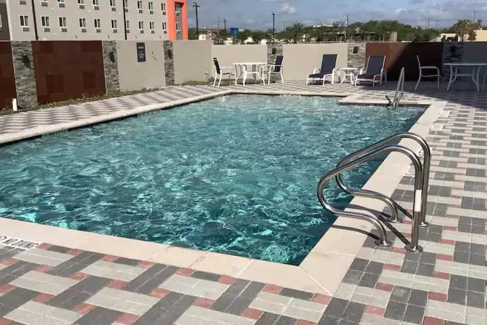 Swimming pool in La Quinta Inn & Suites by Wyndham Corpus Christi Southeast