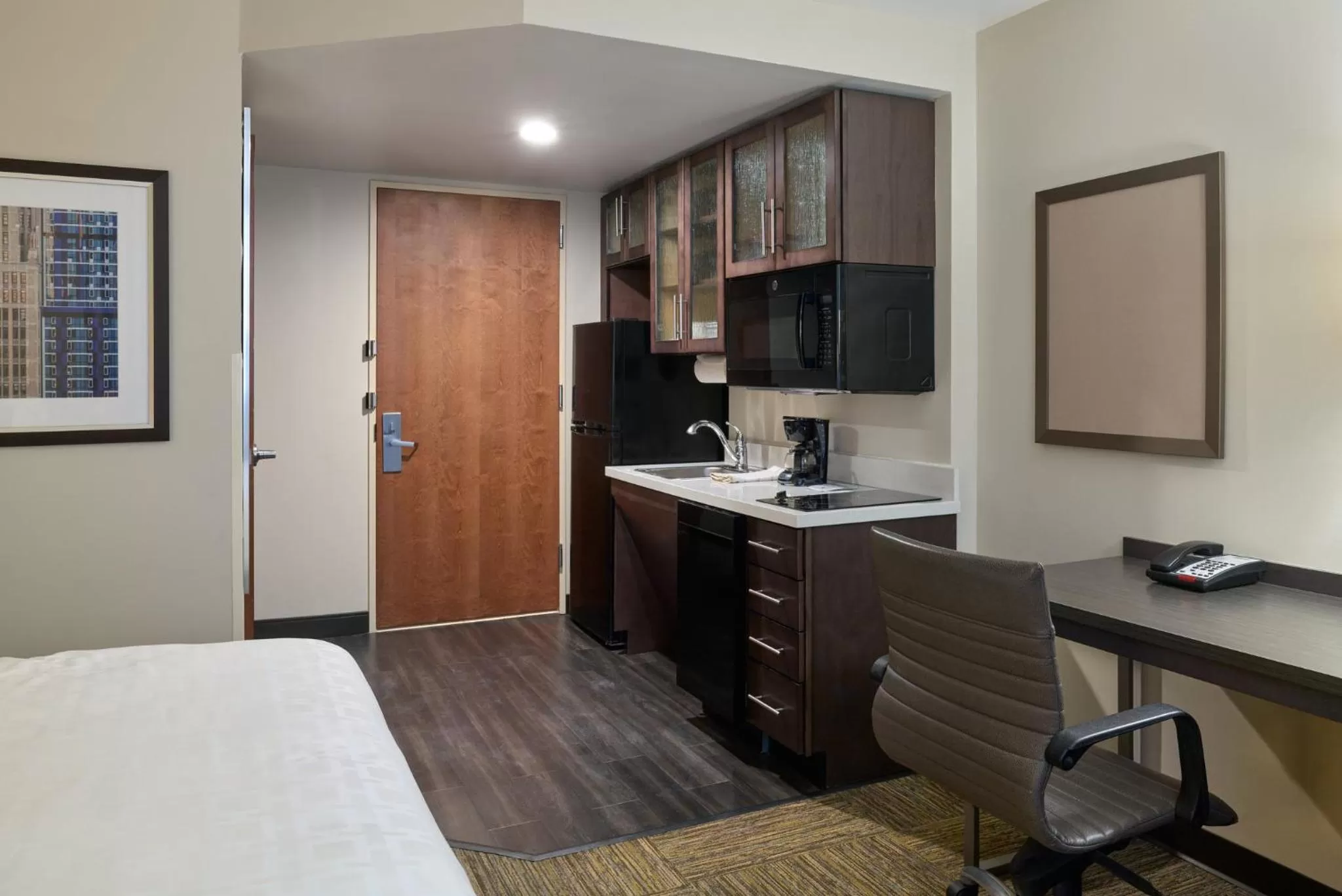 Photo of the whole room, Bed in Candlewood Suites NYC -Times Square by IHG