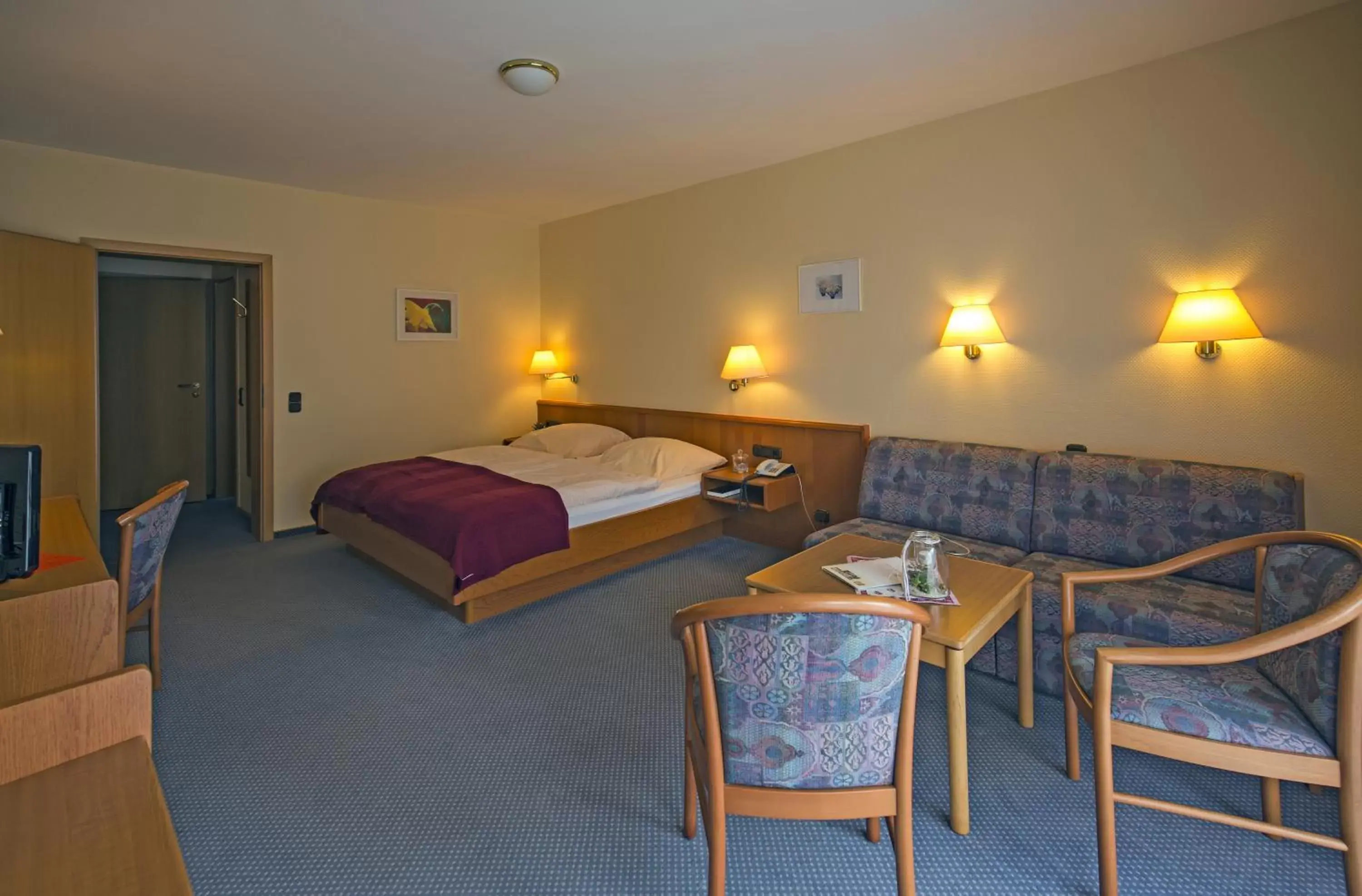 Photo of the whole room, Bed in Hotel Wittensee Schützenhof