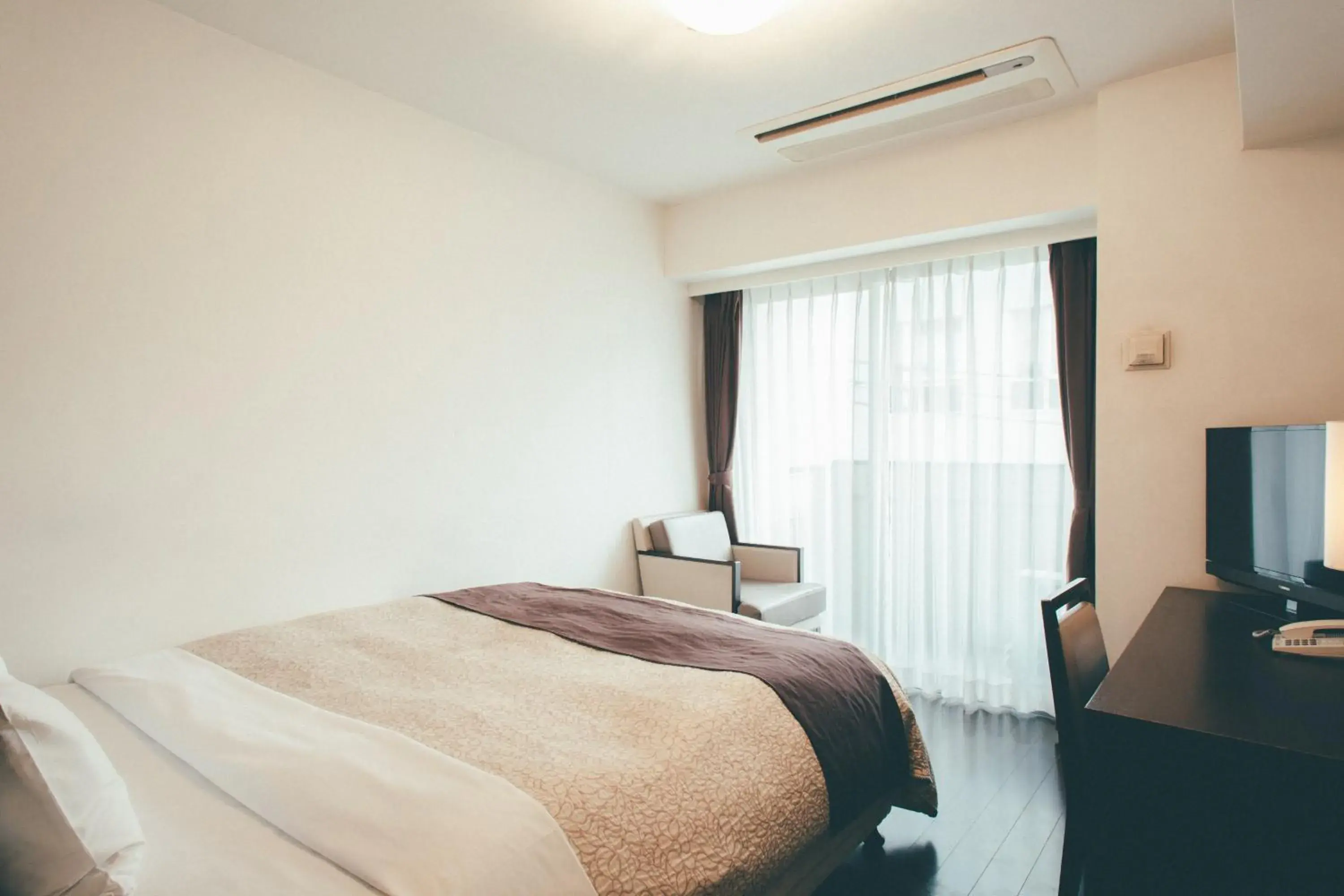 Bed in Kuretake Inn Premium Hamamatsucho Bed in Kuretake Inn Premium Hamamatsucho