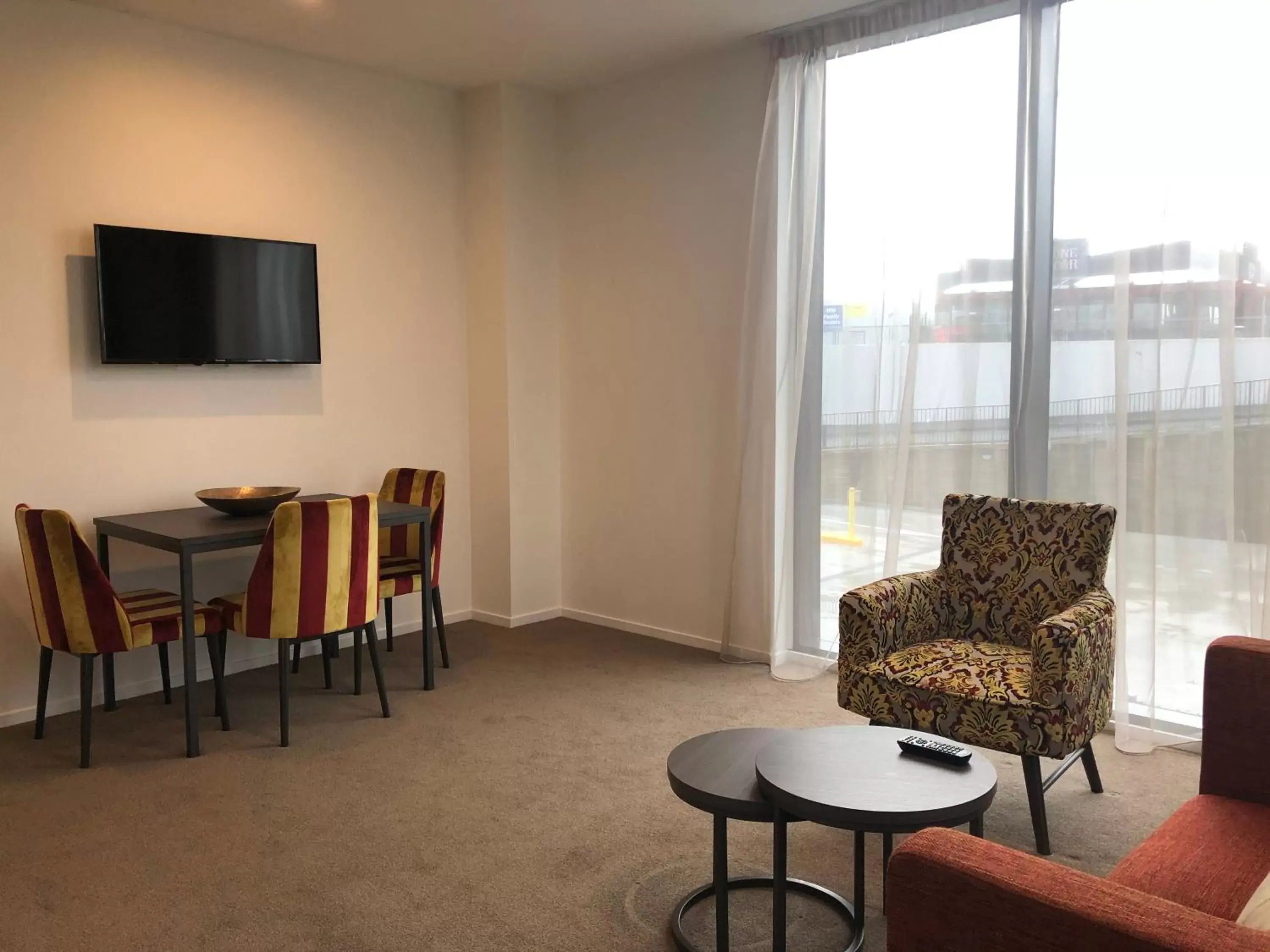 TV and multimedia, Seating Area in Ramada Suites by Wyndham Manukau