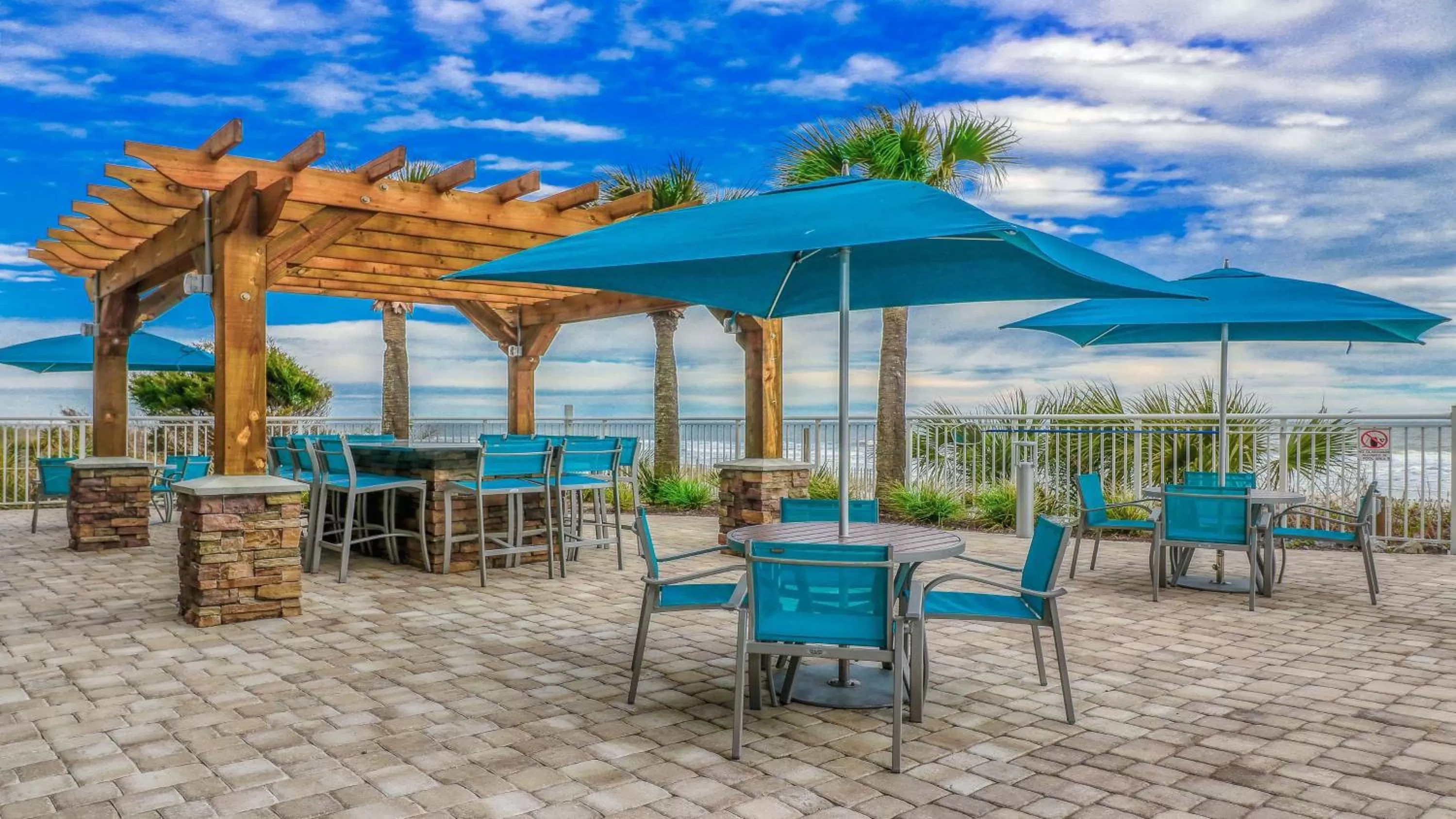 Patio in Holiday Inn Resort Oceanfront at Surfside Beach by IHG