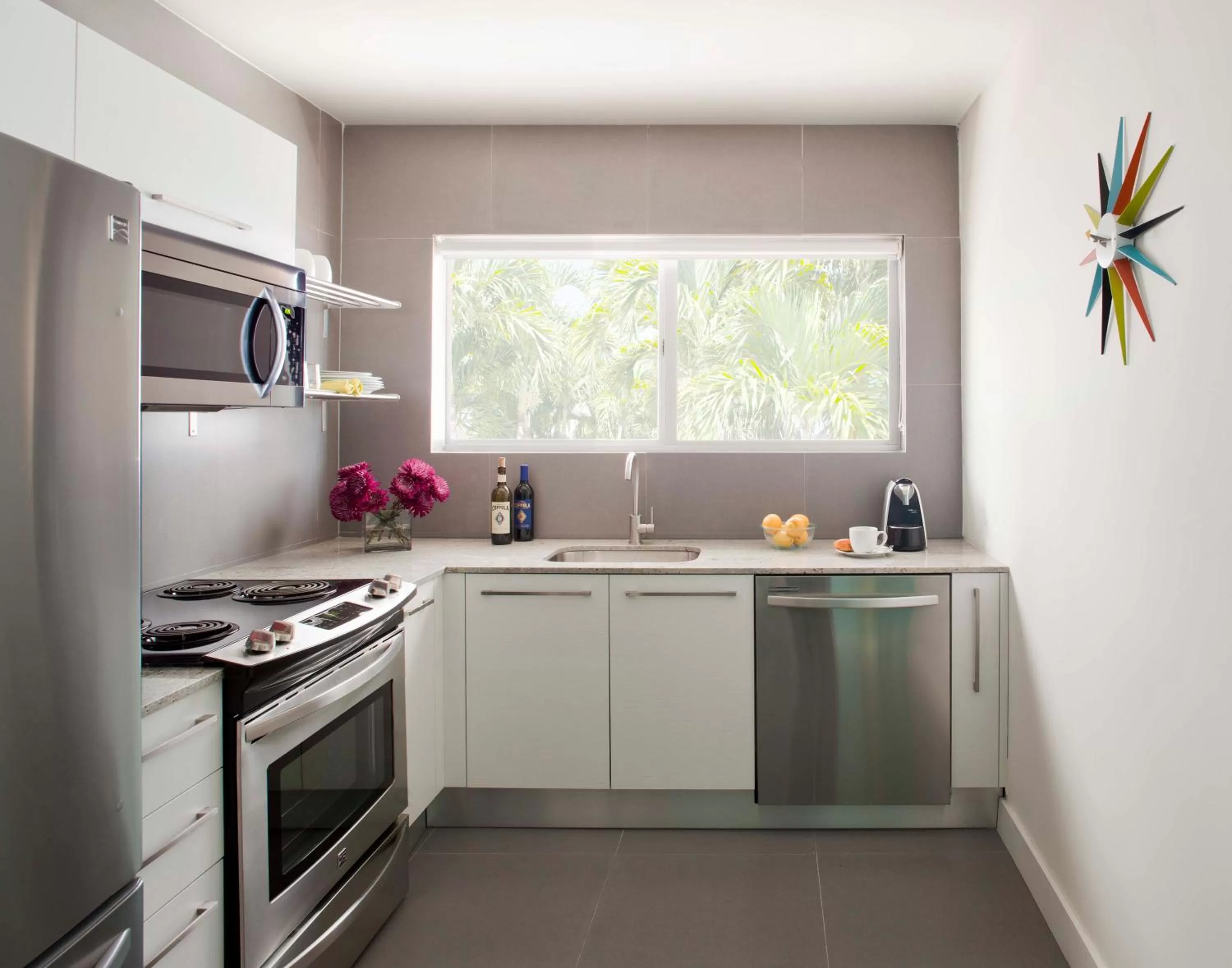 Kitchen or kitchenette in 1818 Meridian House Apartments and Suites by Eskape Collection