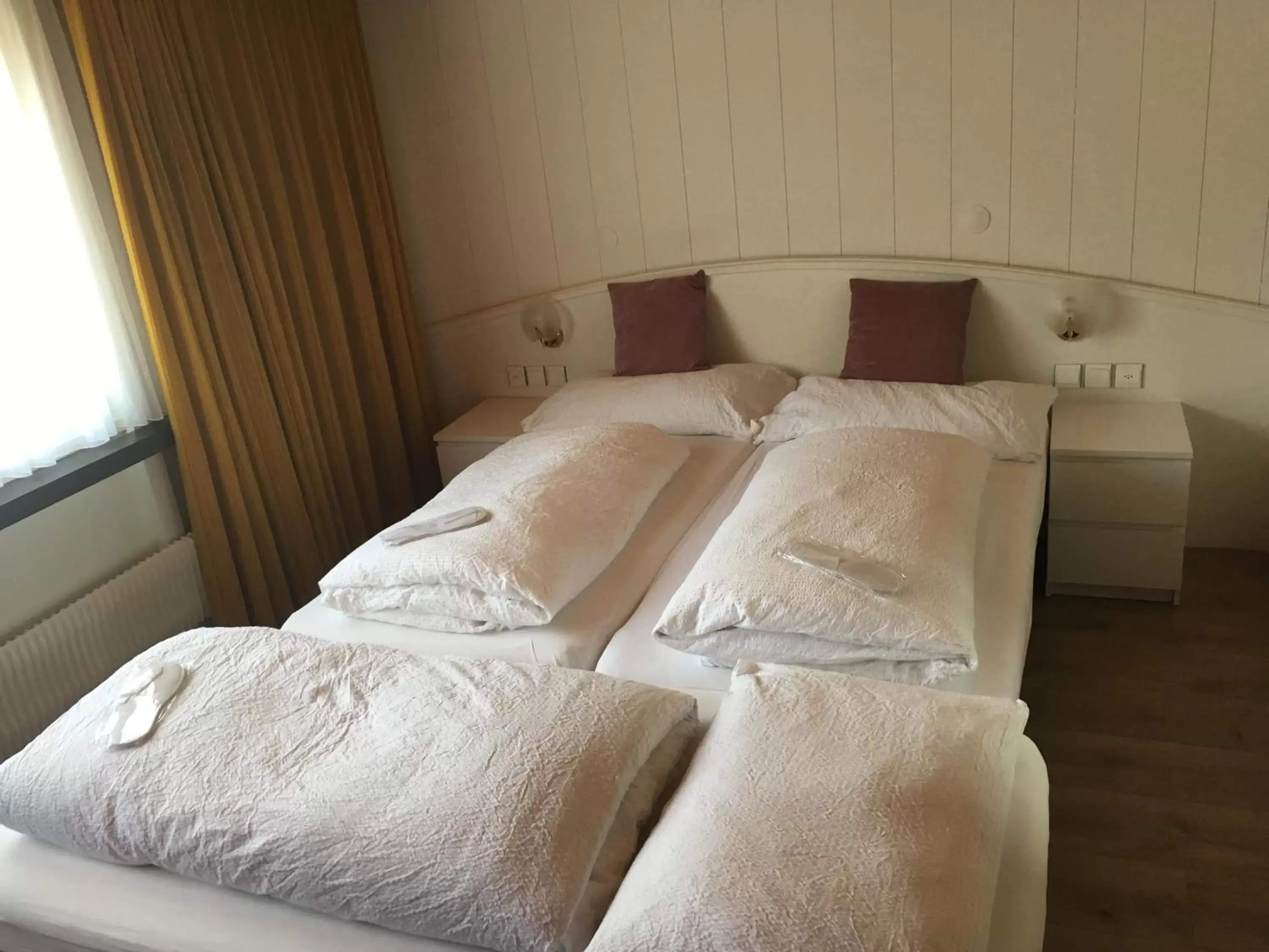 Bed in Hotel Garni Rösslipost
