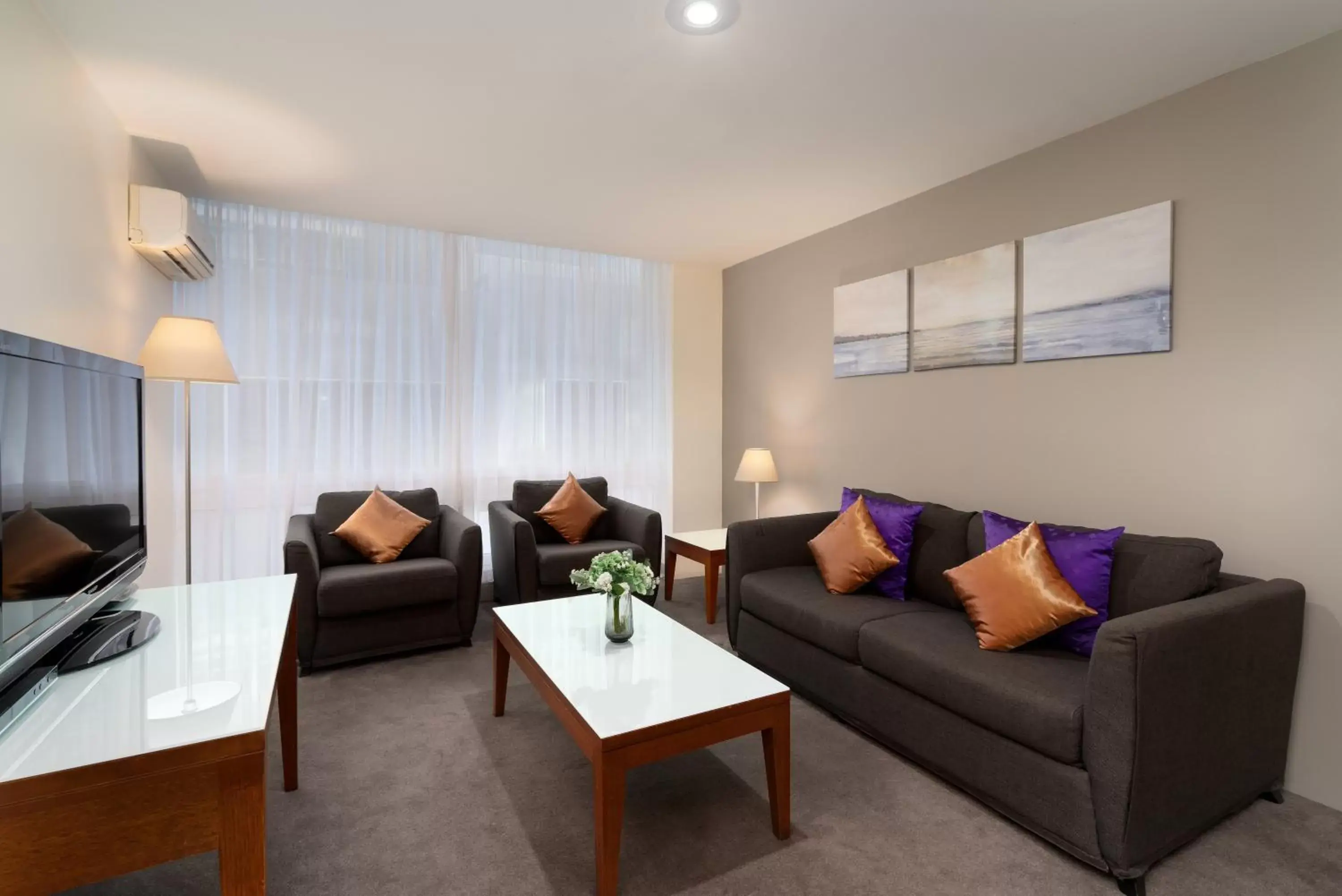 Living room, Seating Area in Park Regis Griffin Suites