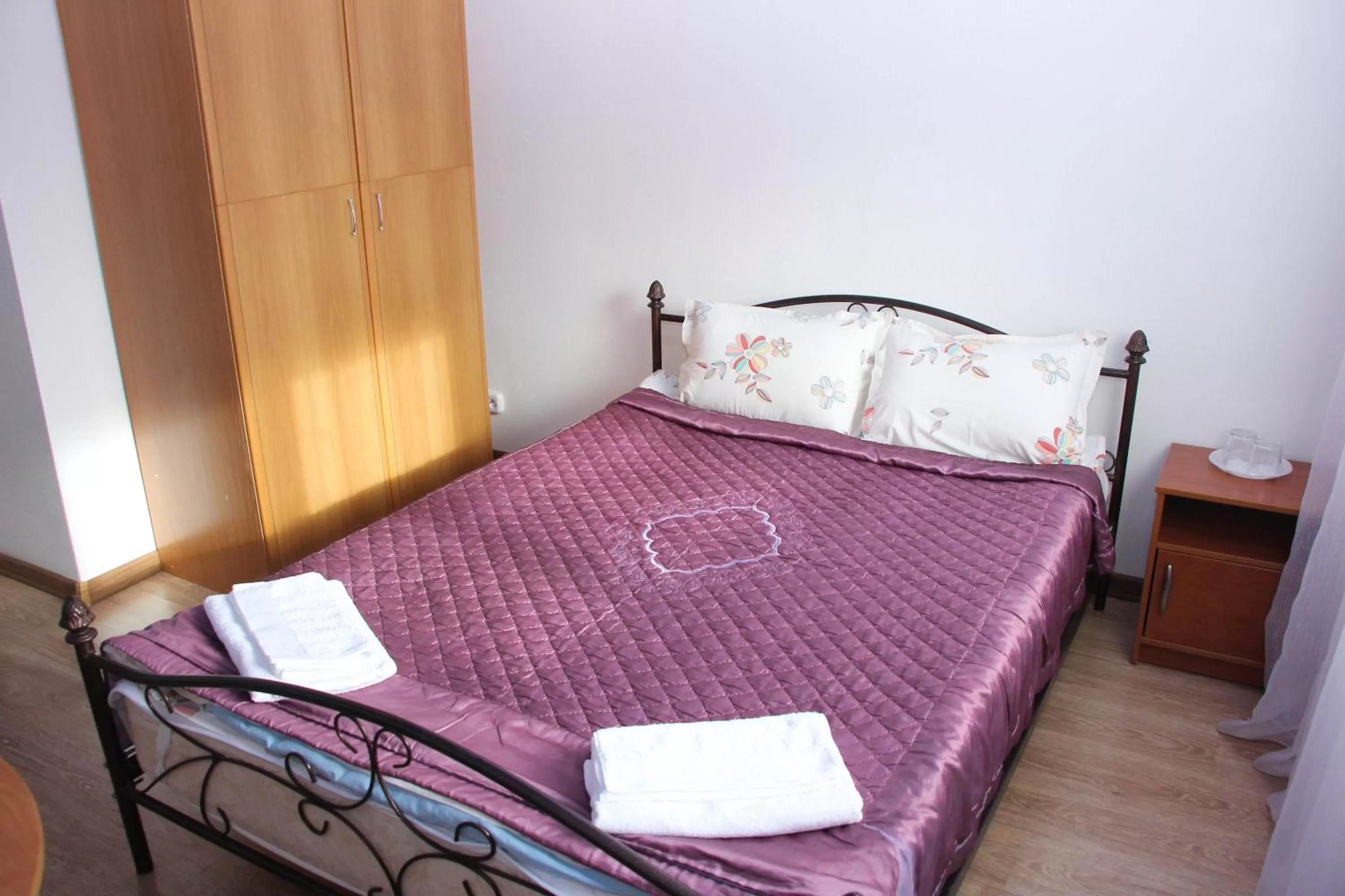 Bed in Zhaylau Hotel