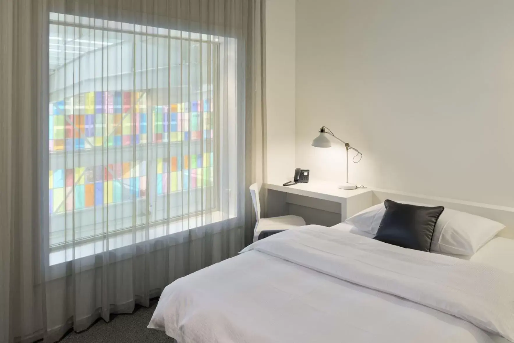 Bed in Trafo Hotel Baden