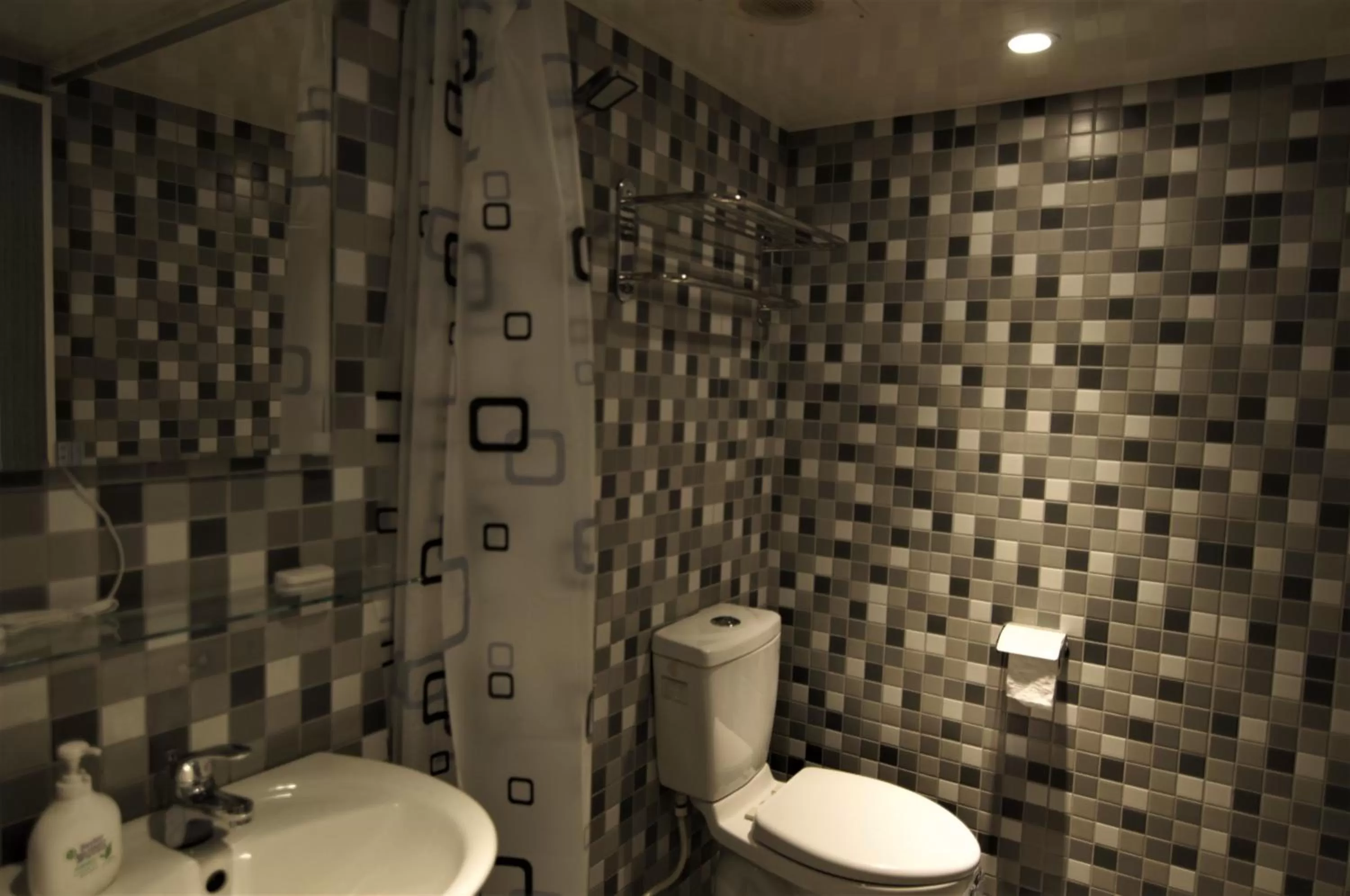 Toilet in 泊居旅店 Oursinn Hotel