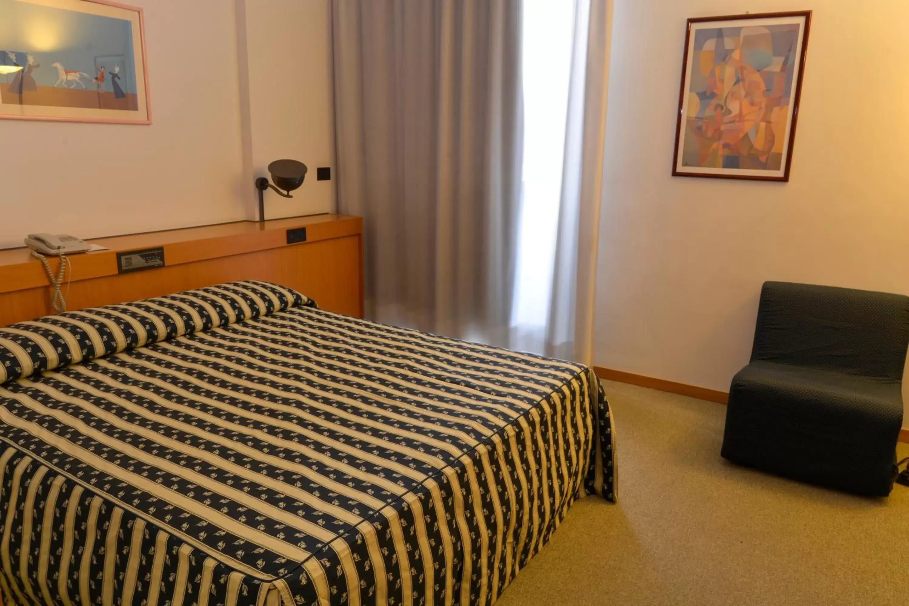 Bed in Grand Hotel Tiziano E Dei Congressi