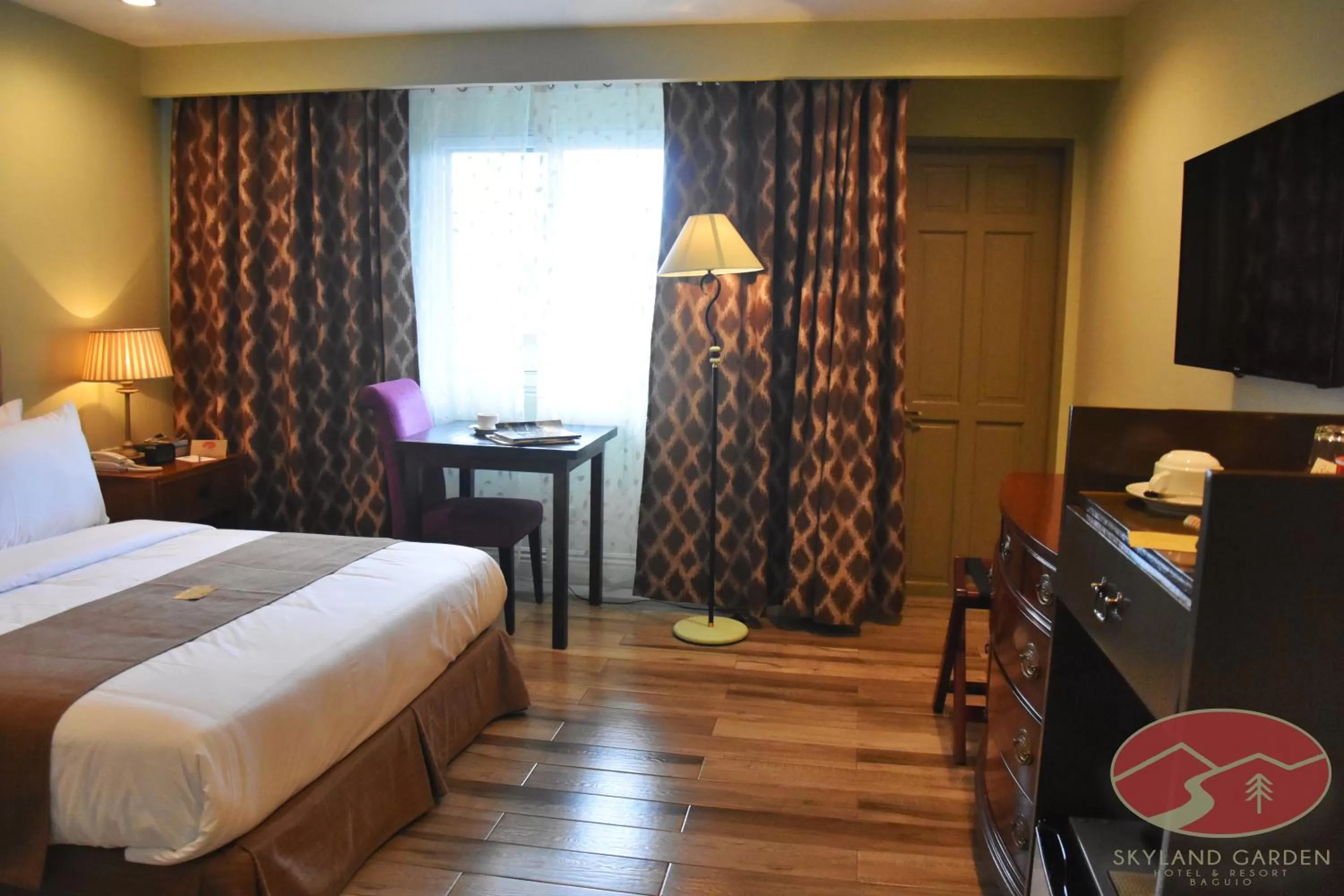 Bed in Skyland Garden Hotel and Resort