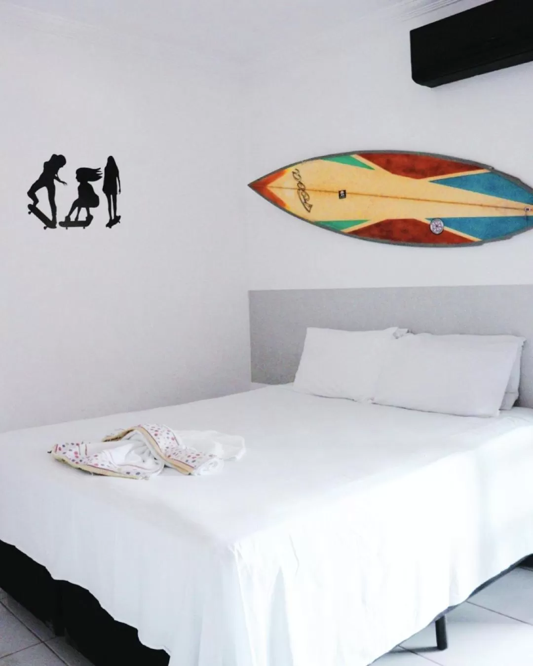 Bed in Pousada Praia do Tombo