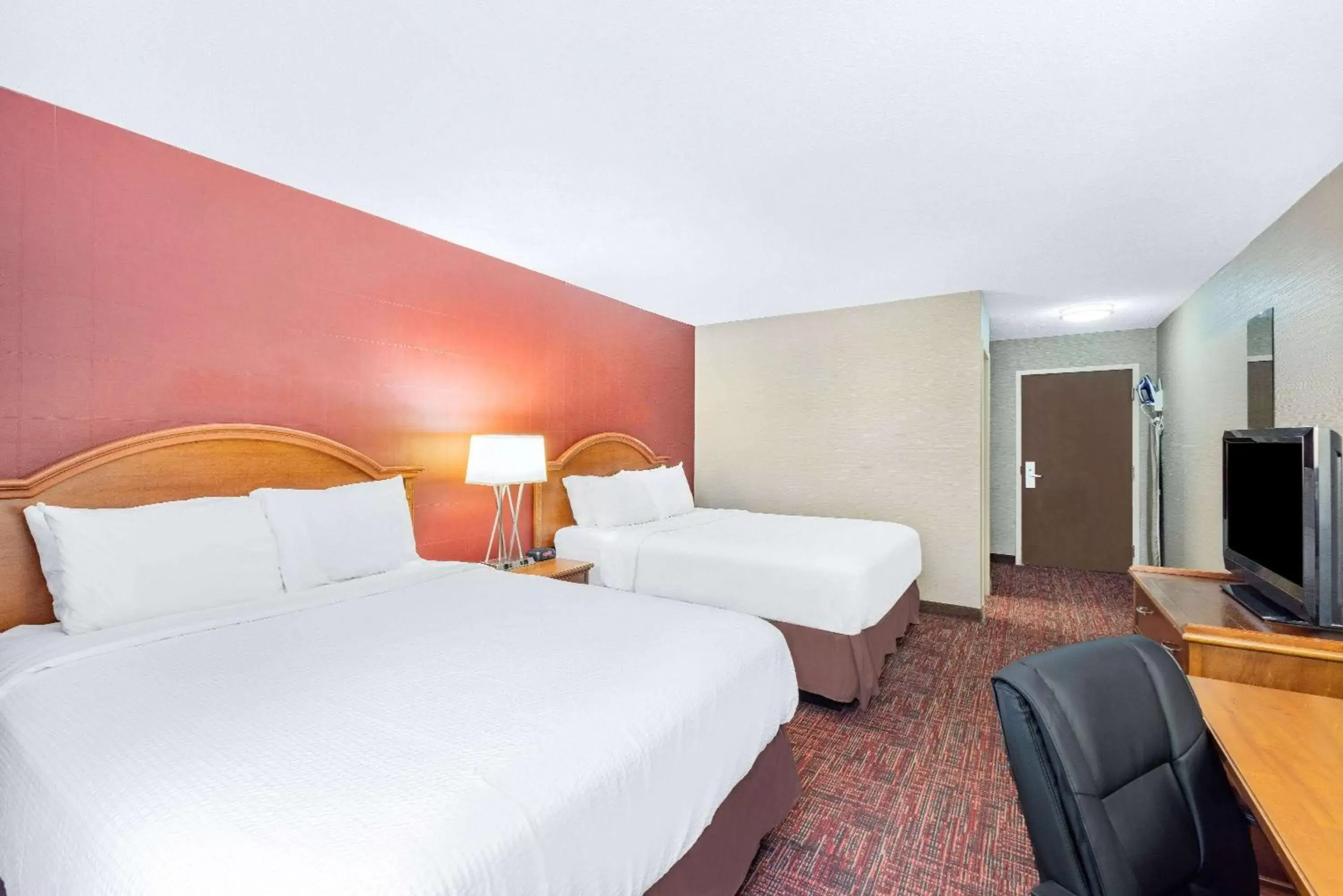 Bed in Ramada by Wyndham Grand Forks