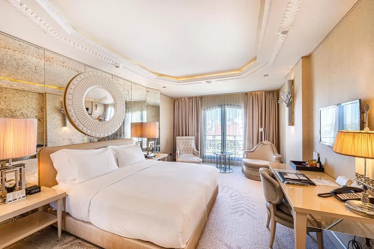 Bed in Wyndham Grand Istanbul Kalamış Marina Hotel