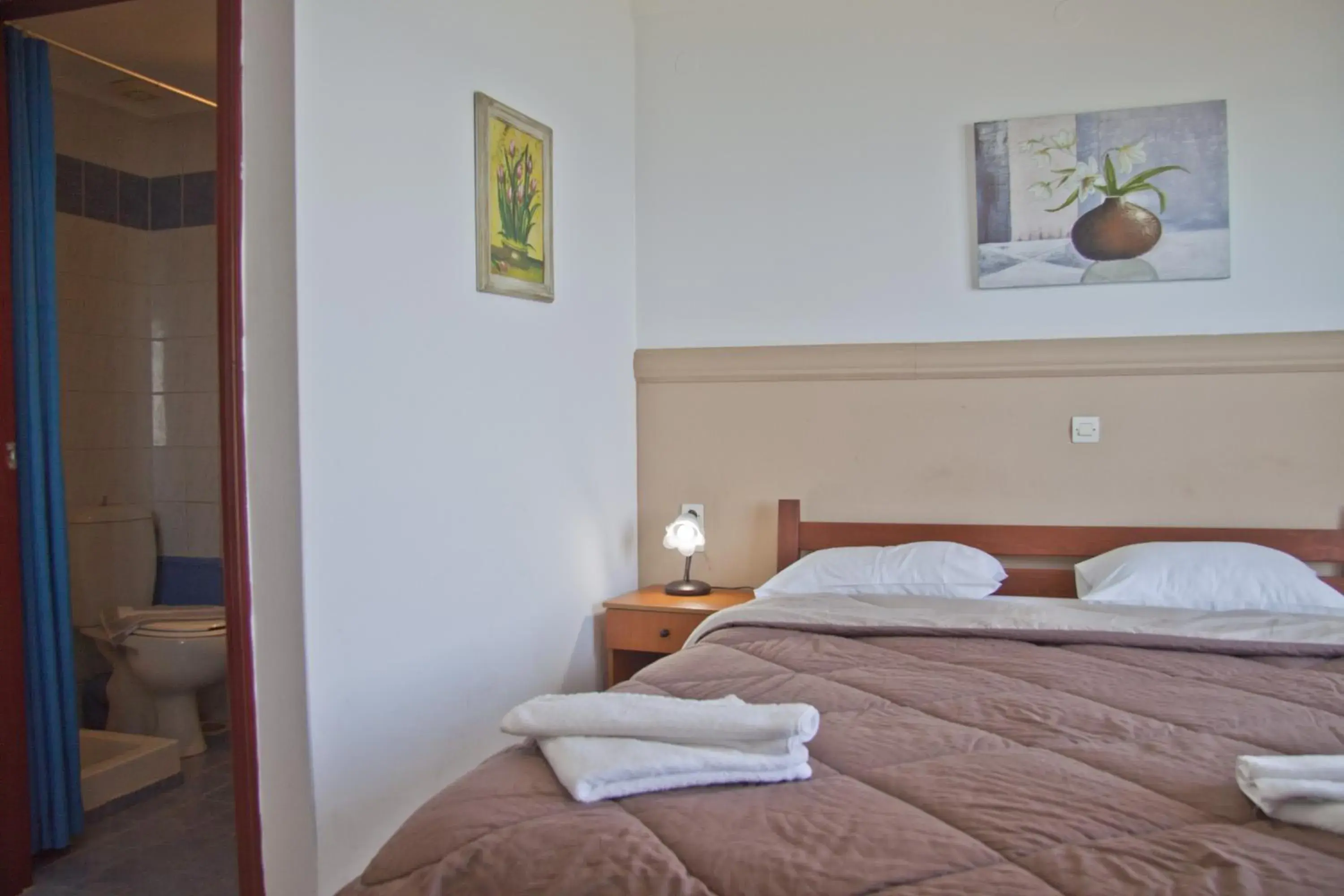 Bed in Danaos Hotel