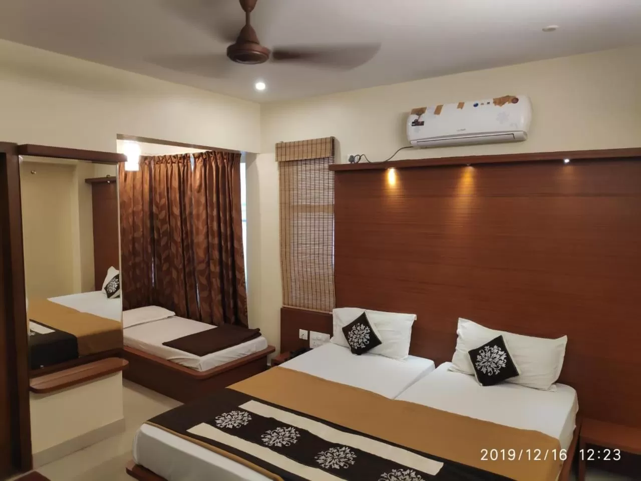 Photo of the whole room, Bed in The Grand Inn Mysore