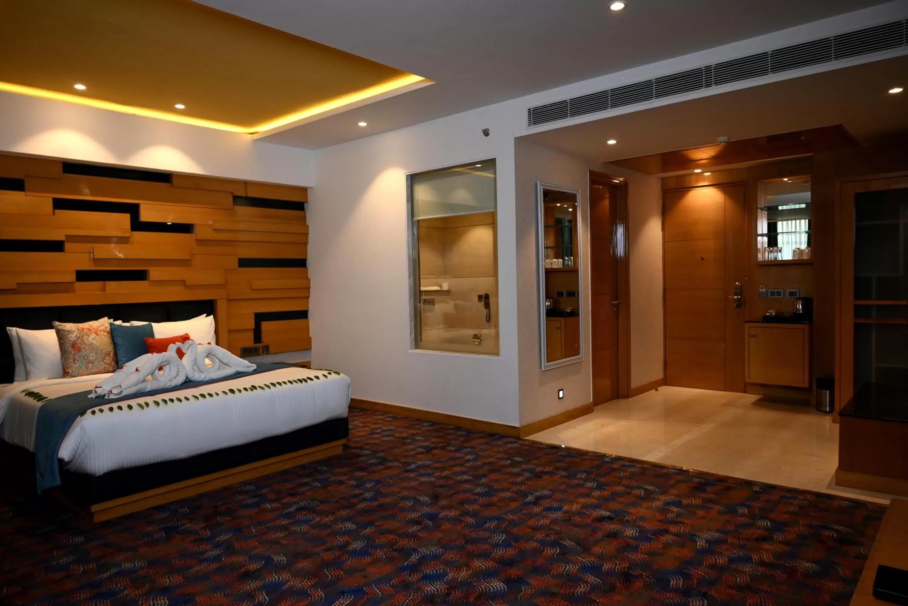 Photo of the whole room, Bed in Ramada Plaza by Wyndham Jammu Vijaypur