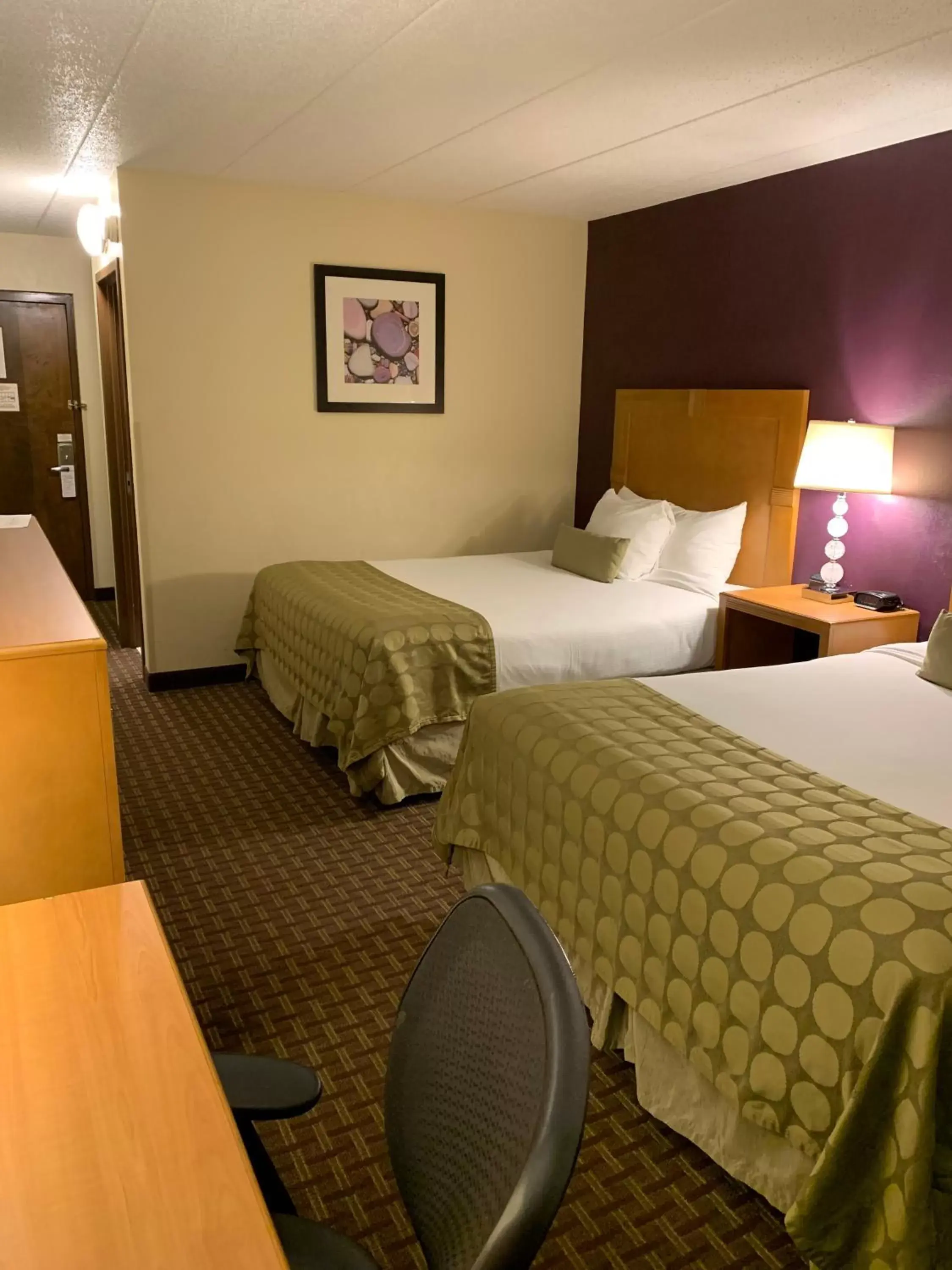 Bed in Ramada by Wyndham Marquette