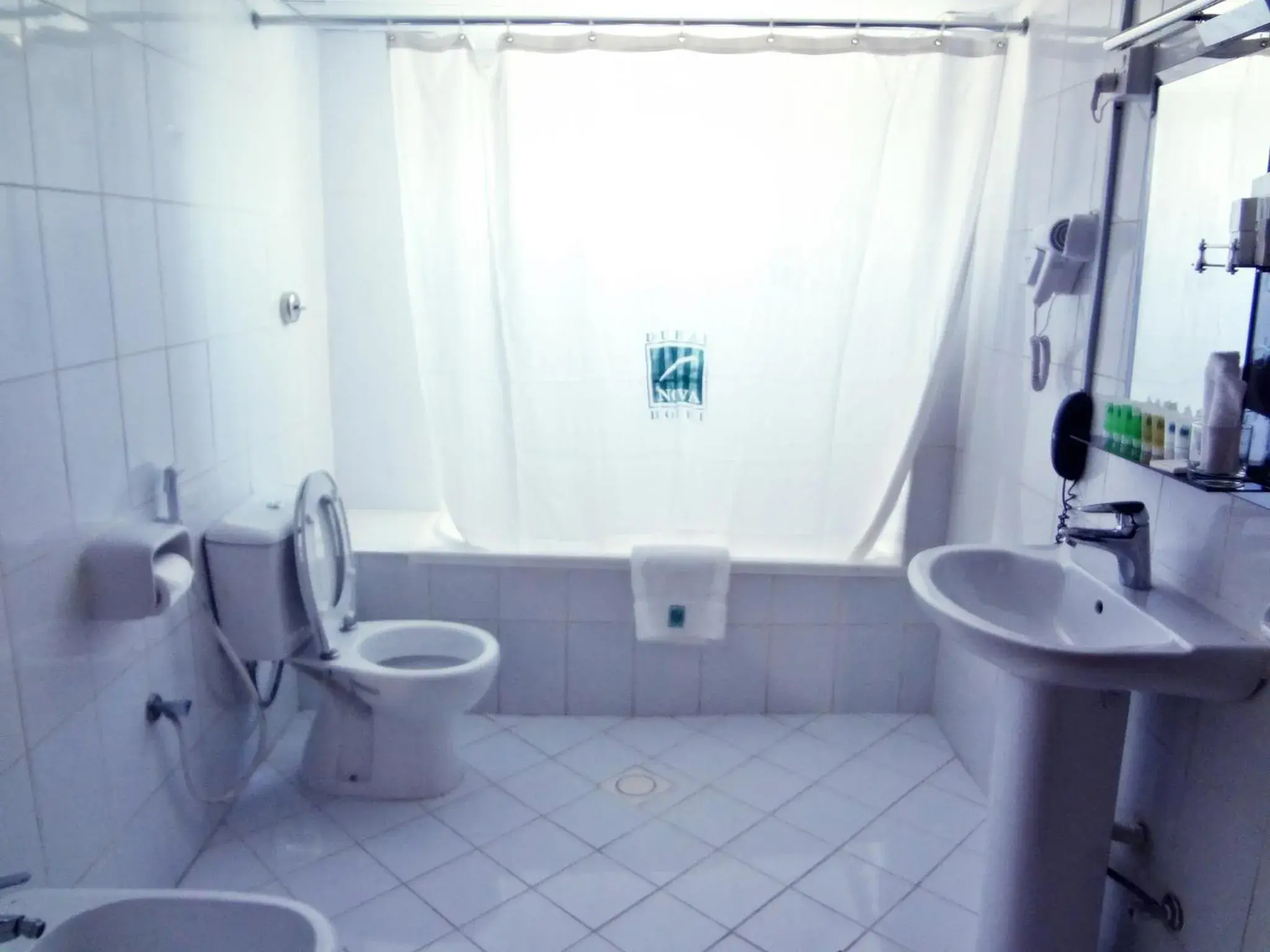 Bathroom in Grand Nova Hotel