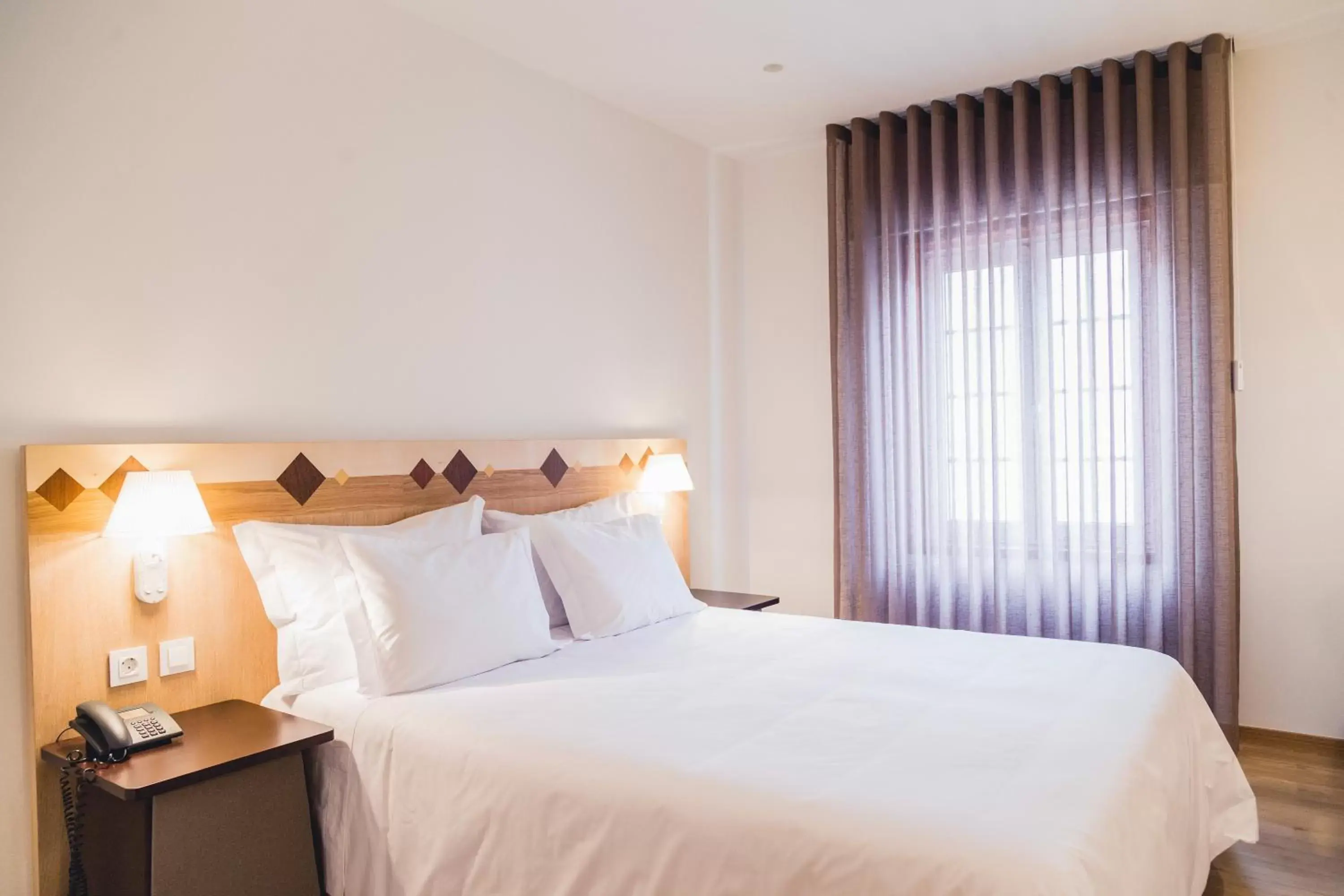 Bedroom, Bed in Hotel Aveiro Center