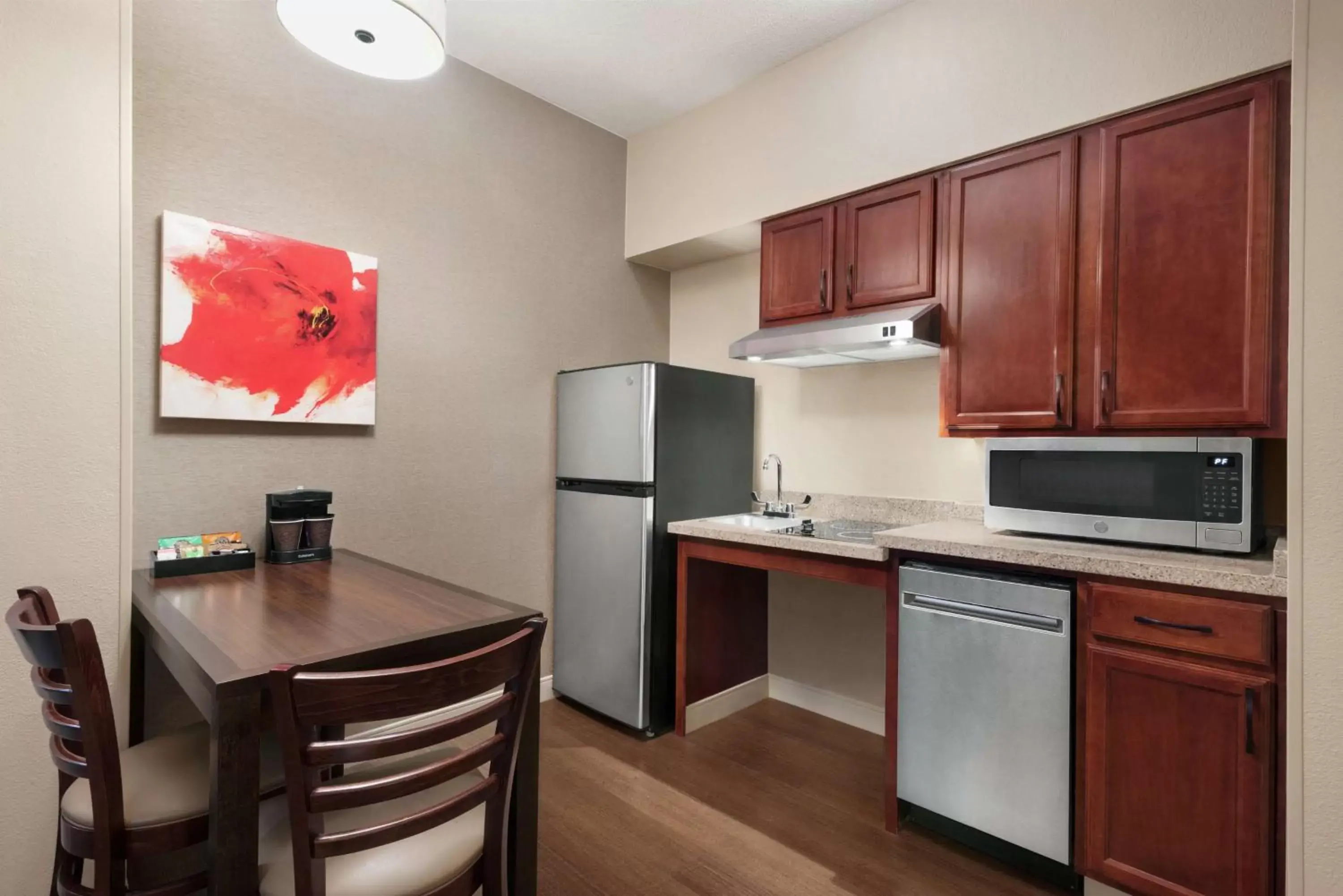 Bedroom, Kitchen/Kitchenette in Homewood Suites Rochester-Henrietta