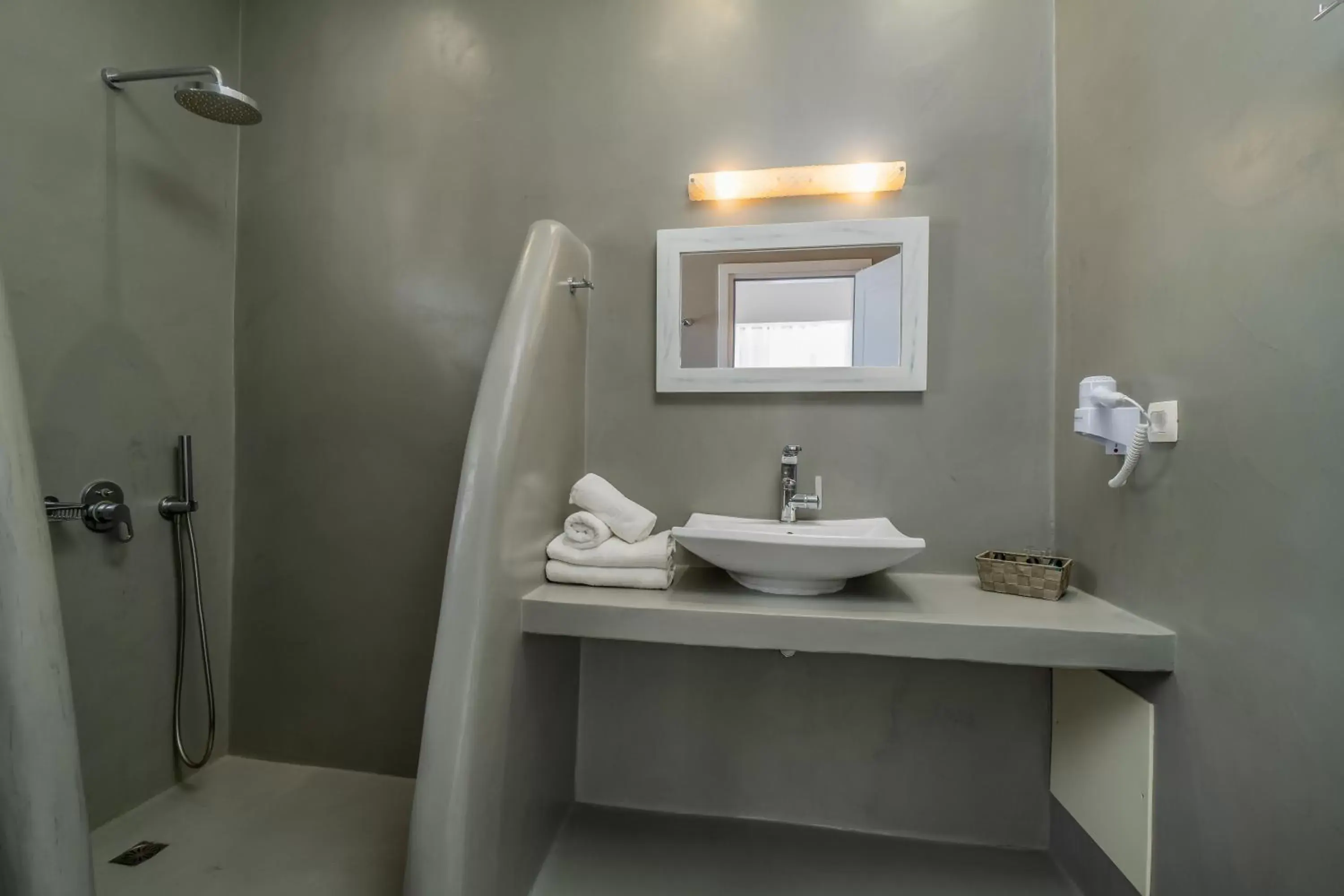 Bathroom in Central Fira Suites