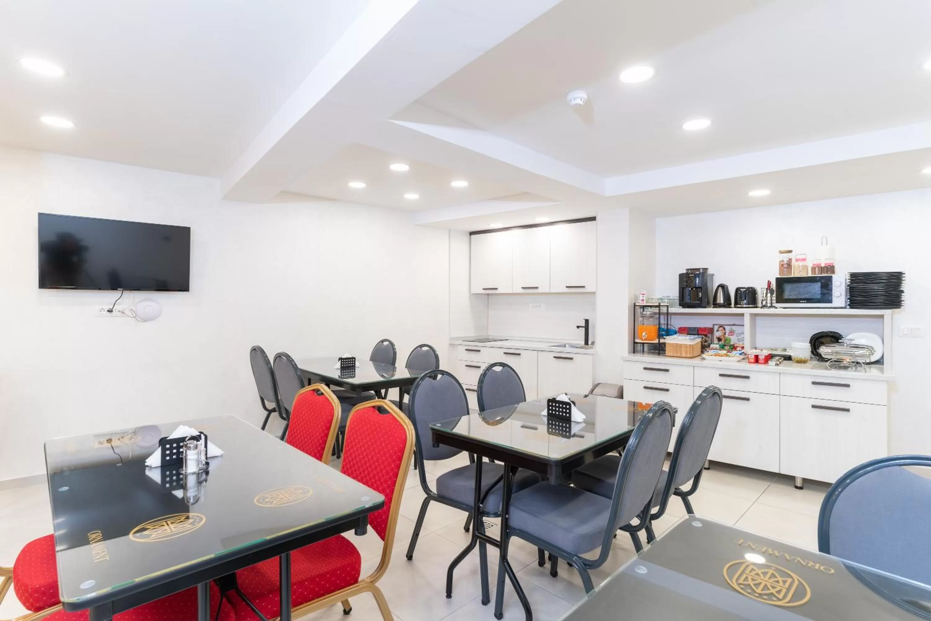 Kitchen or kitchenette in Ornament Hotel and Apartments