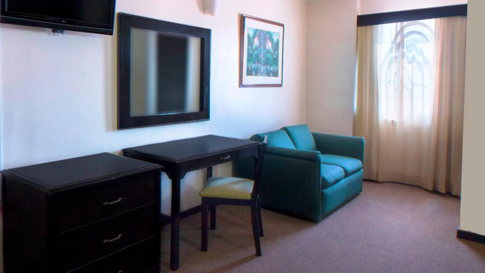 Living room in CHN Hotel Monterrey Santa Fe